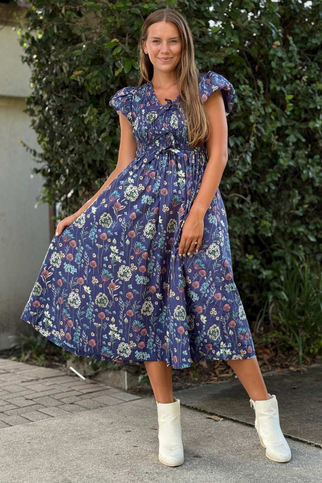 Order The Wildflower Waltz Midi Dress in Midnight Blue