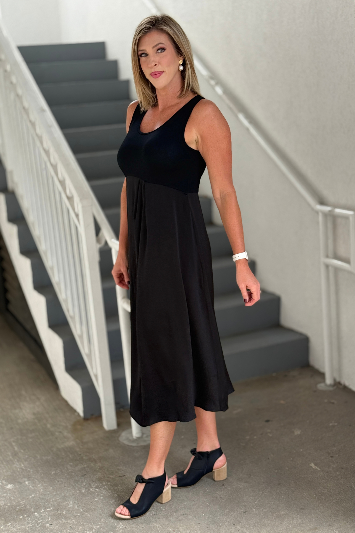 Boutique black knit and satin dress
Year-round black midi dress for women