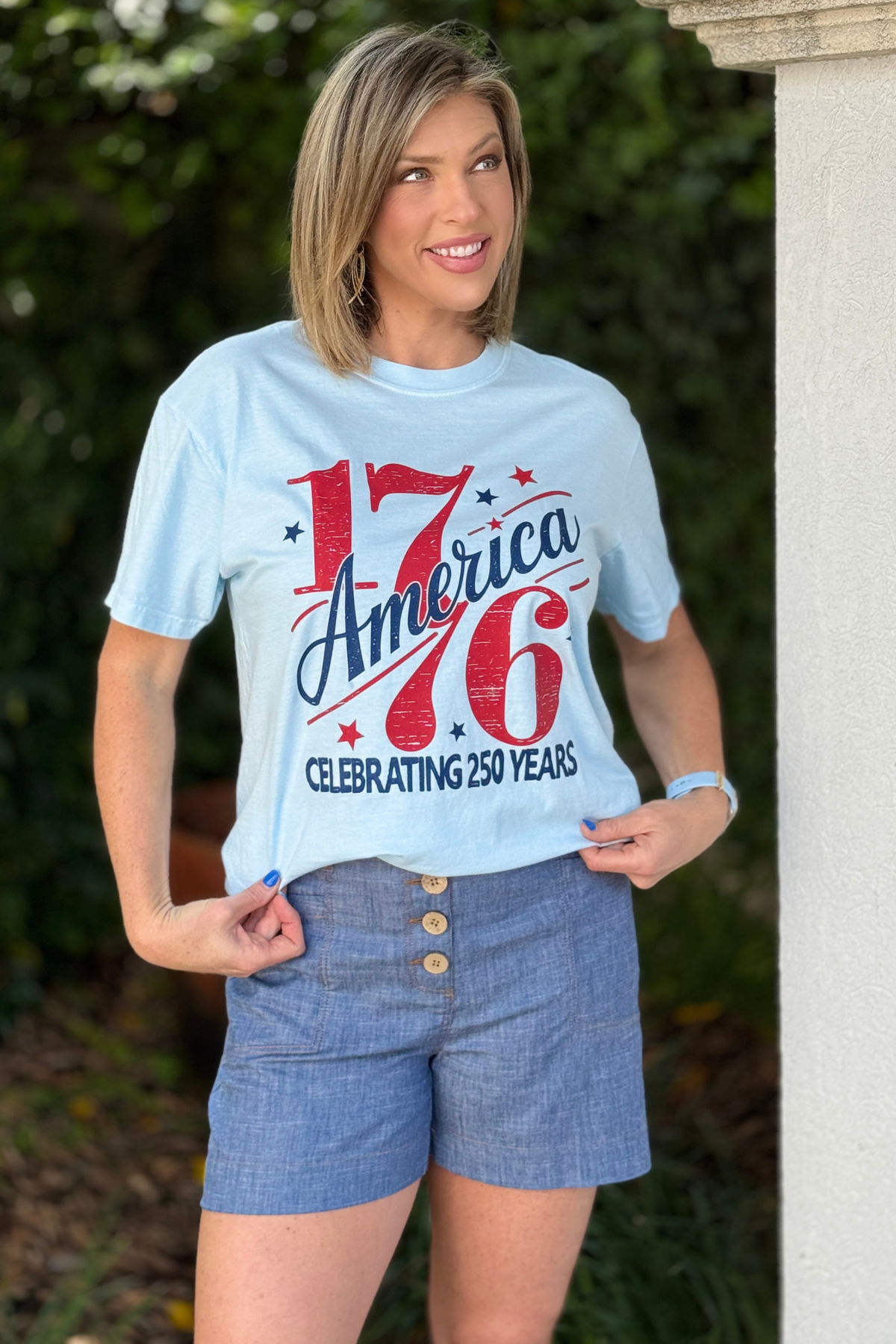 1776 America graphic tee on light blue comfort colors shirt
