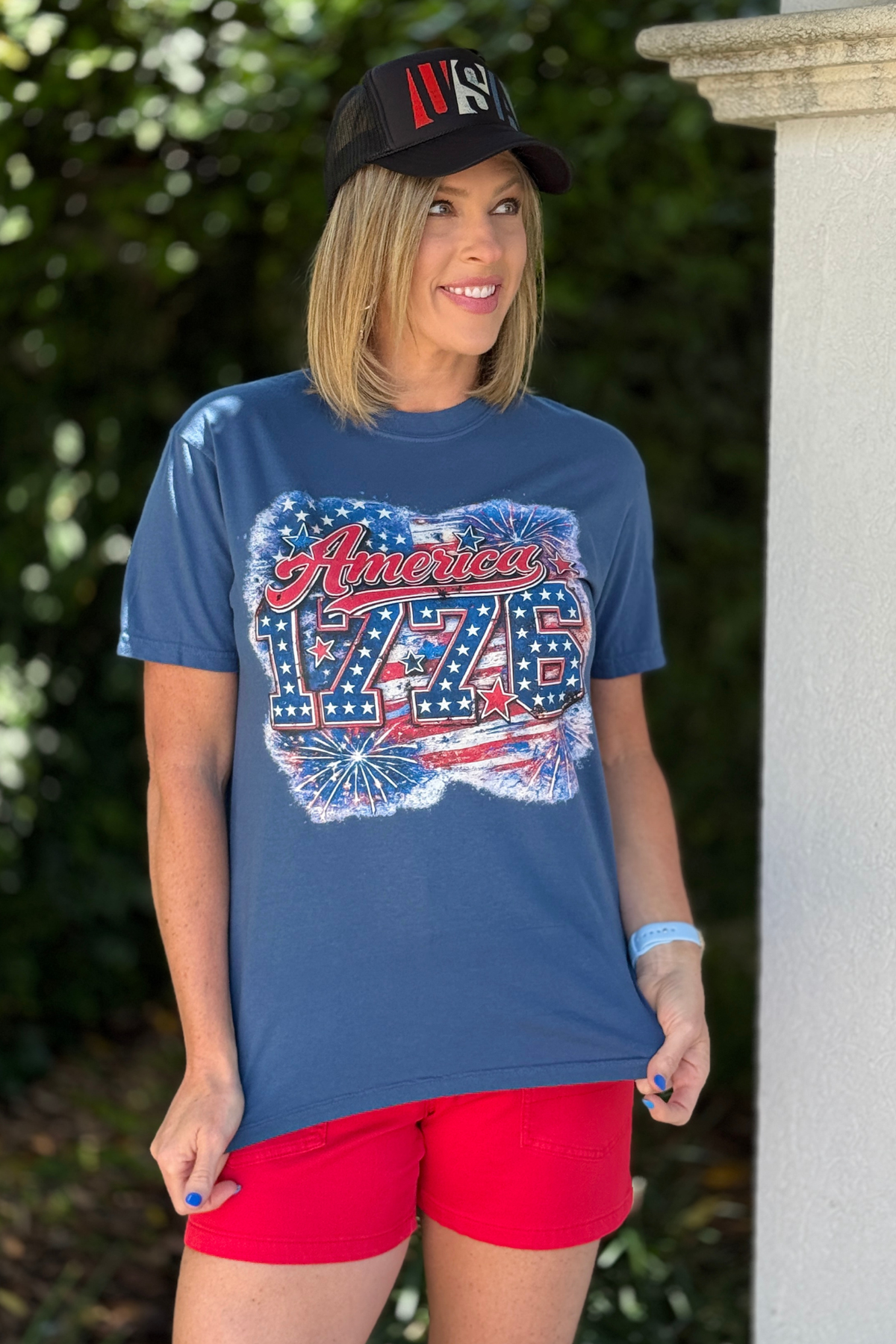 women's patriotic t shirt styled with red shorts