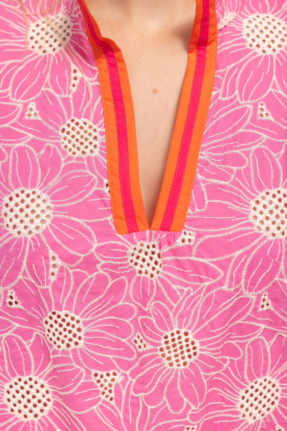 Boutique pink and orange statement blouse for spring events