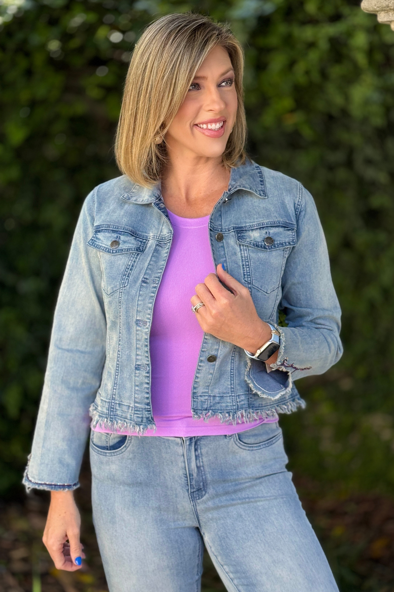 denim jacket with colorful butterfly design