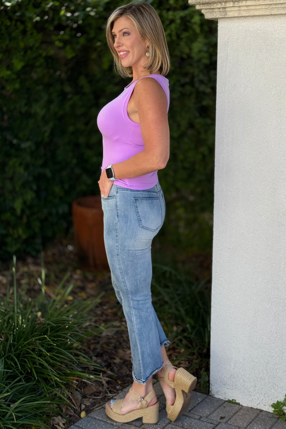 cutout hem jeans styled with heels