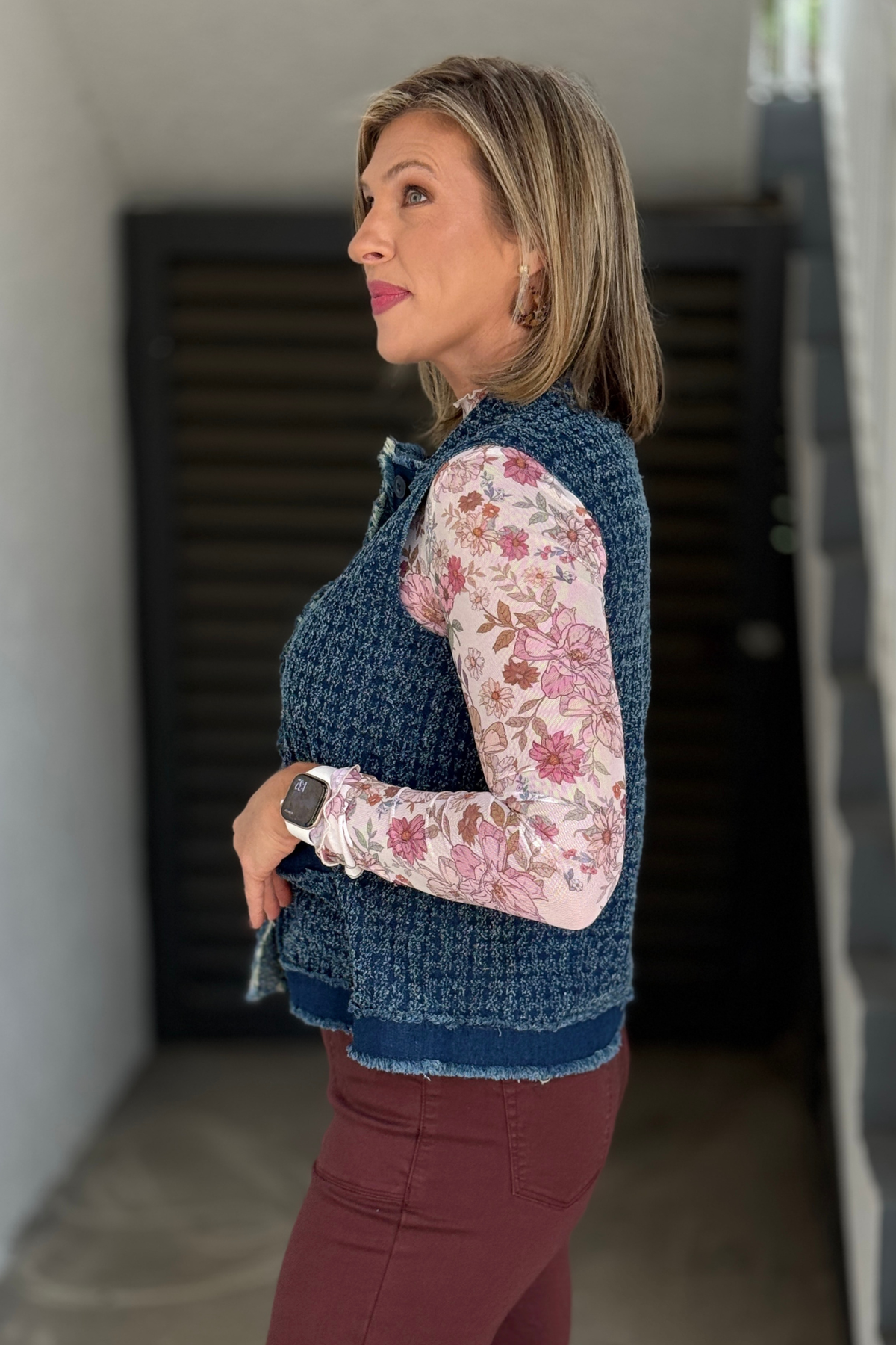 Sleeveless denim layering vest with patch pockets side view