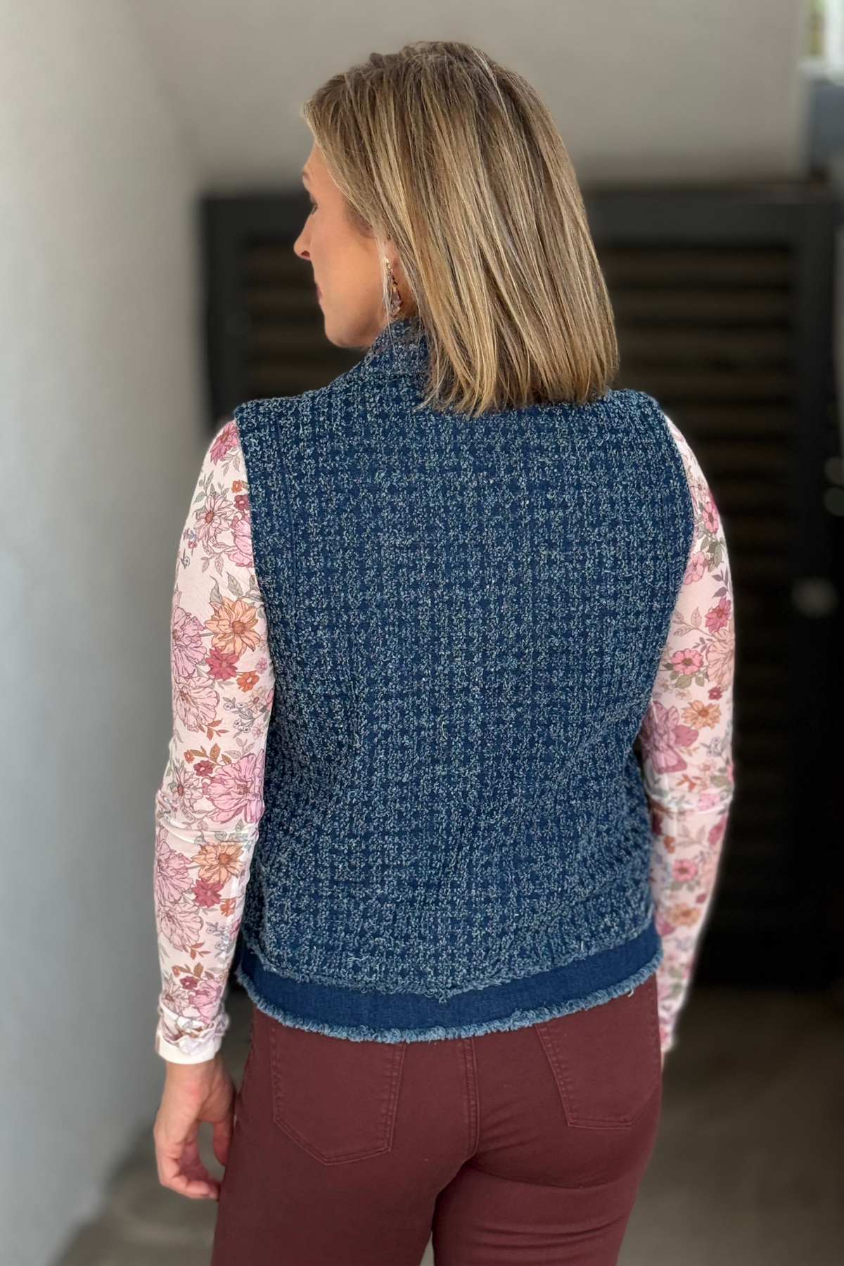 Women’s boutique denim vest styled with Fig colored pants