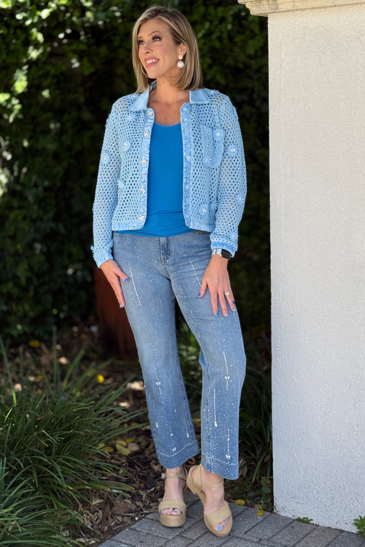 bow detail jeans light wash front view