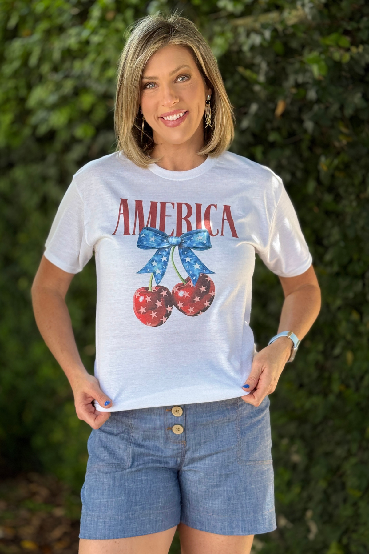white patriotic t-shirt with red America text and star cherries