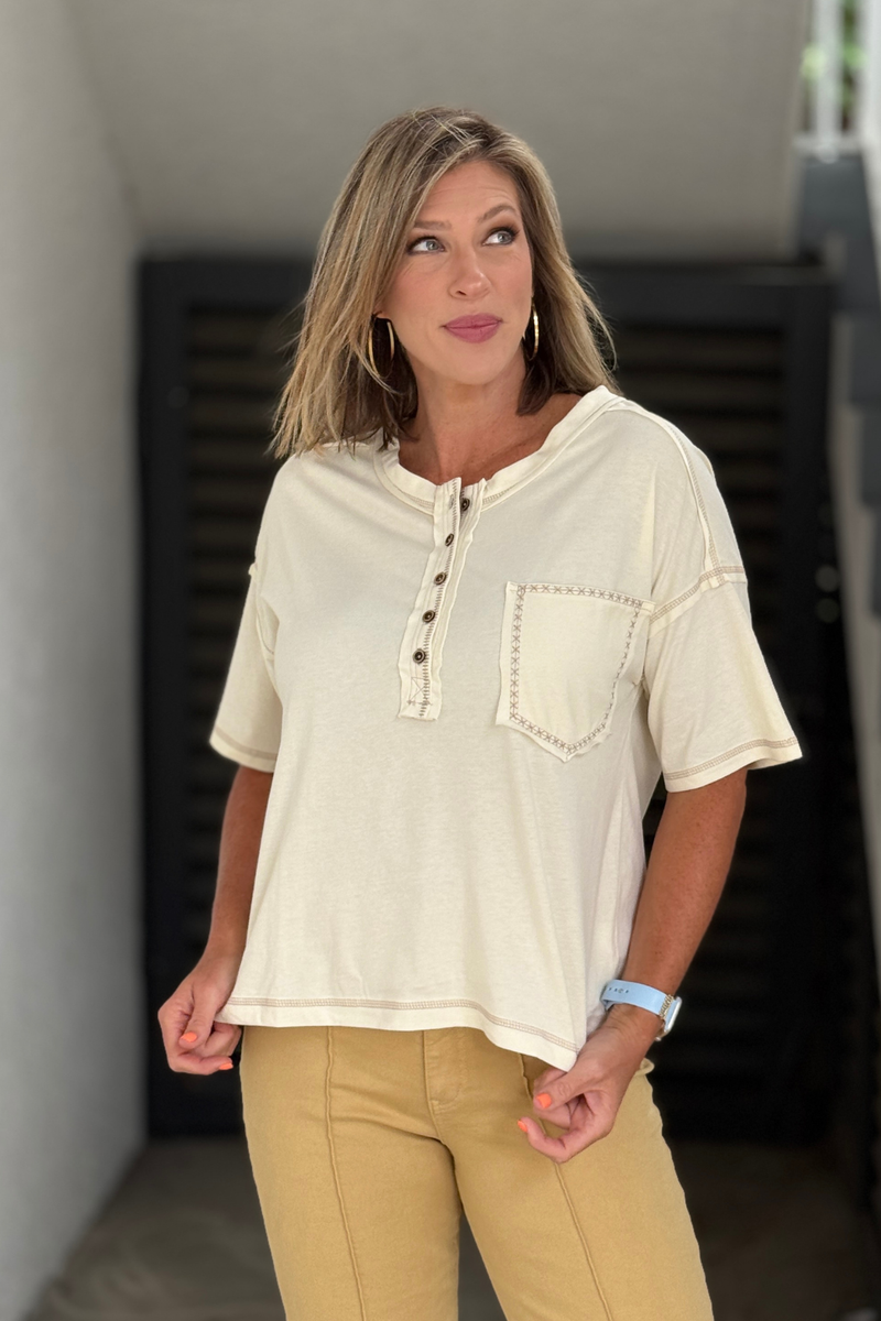 Ivory mineral washed oversized Henley knit top