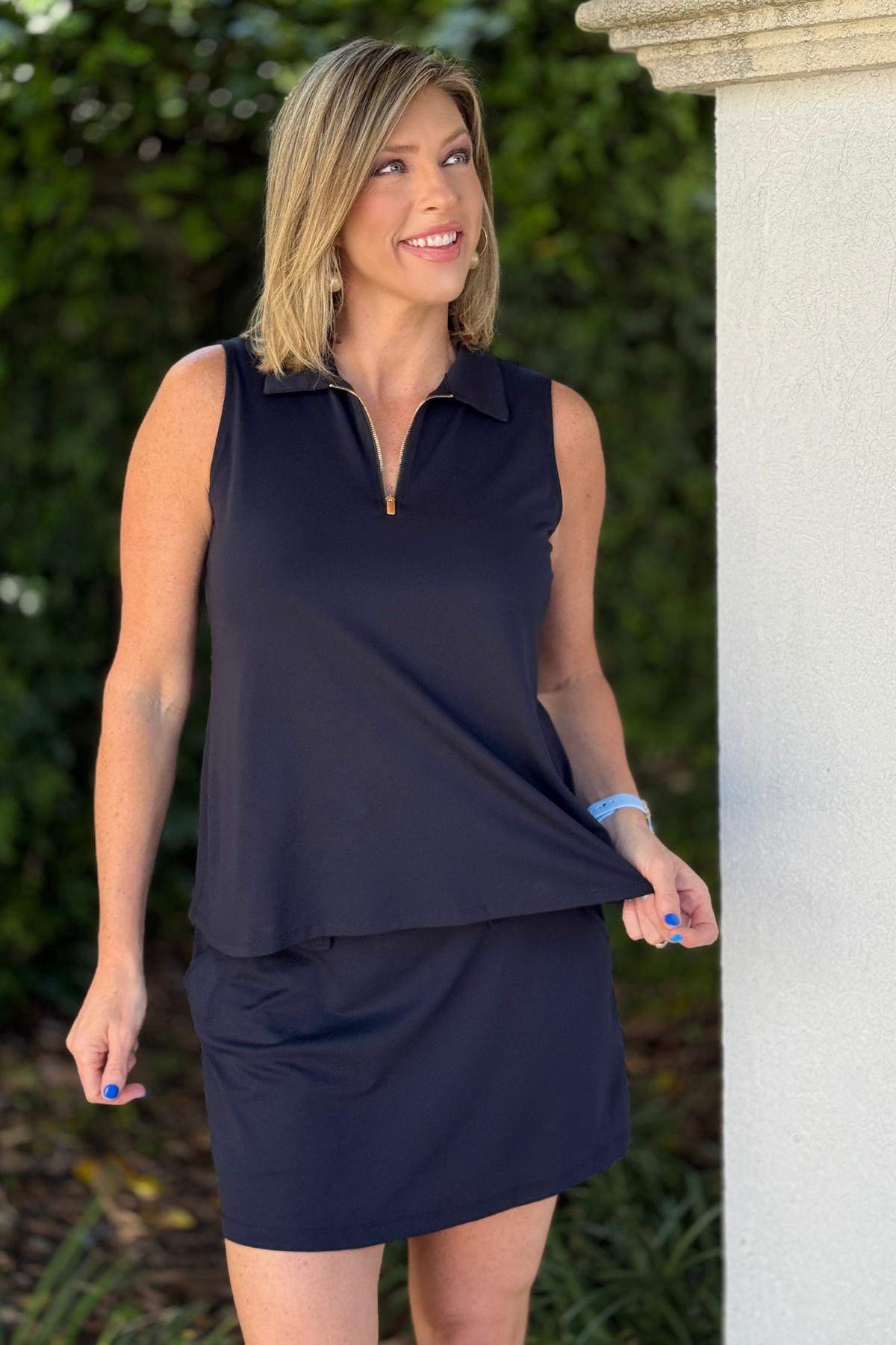 black quarter zip sleeveless tank front view