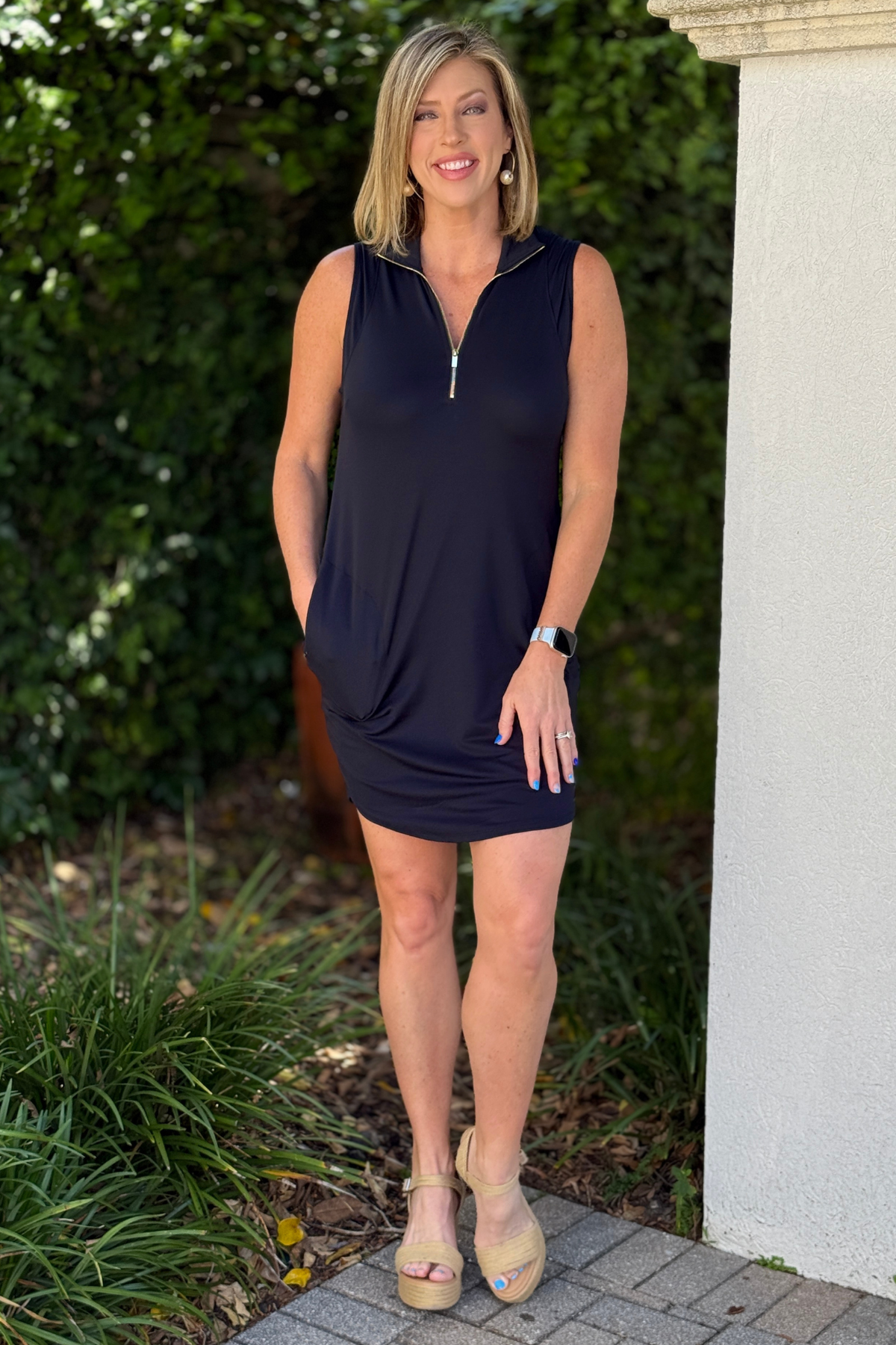 black sleeveless zip front tennis dress with collar