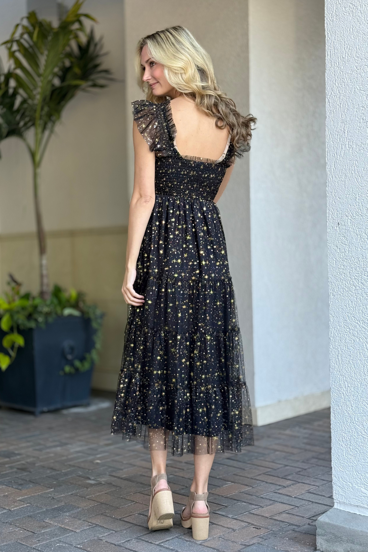 Black and gold shimmer mesh dress side angle
