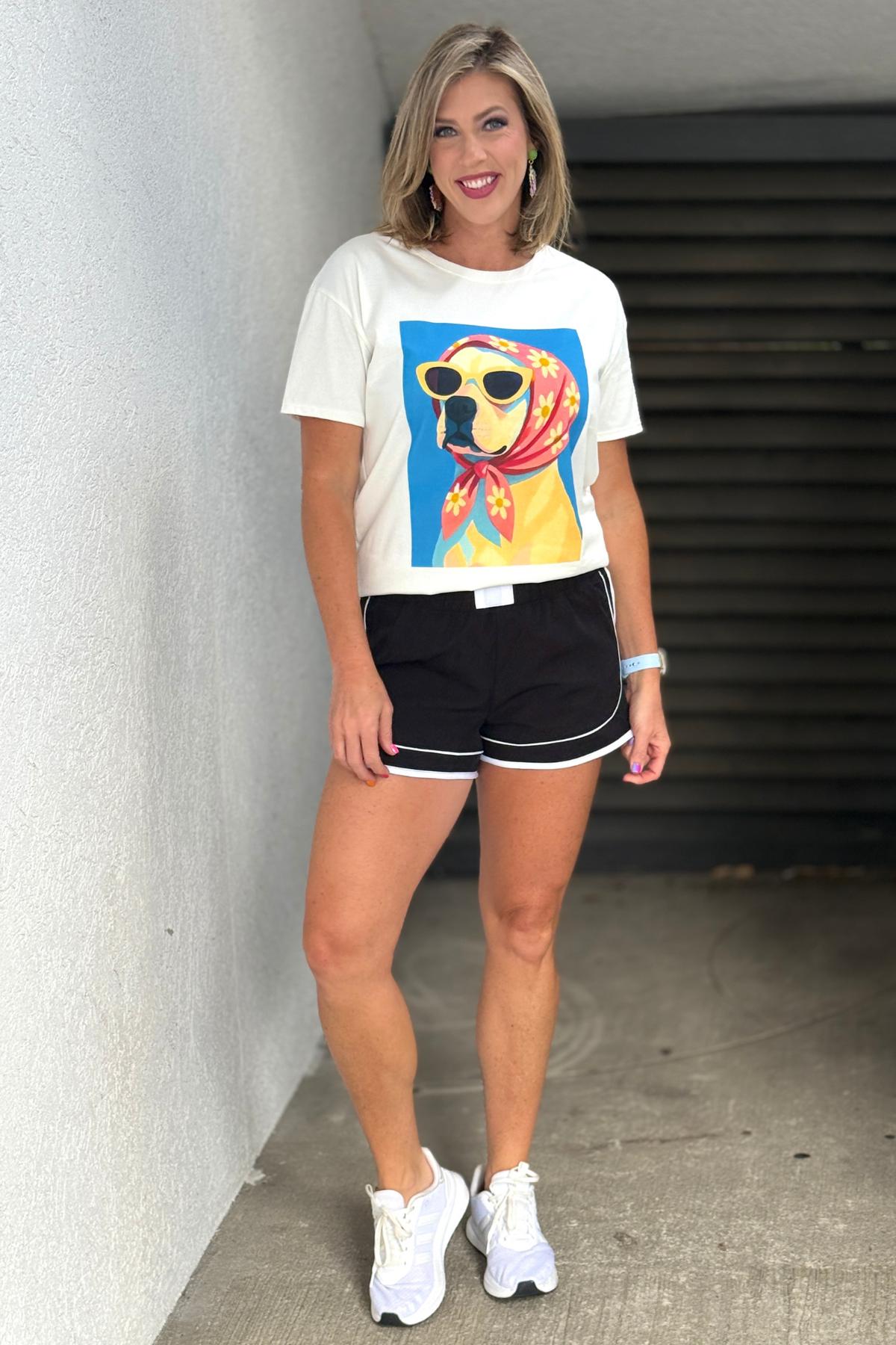 Black dolphin shorts with white contrast piping