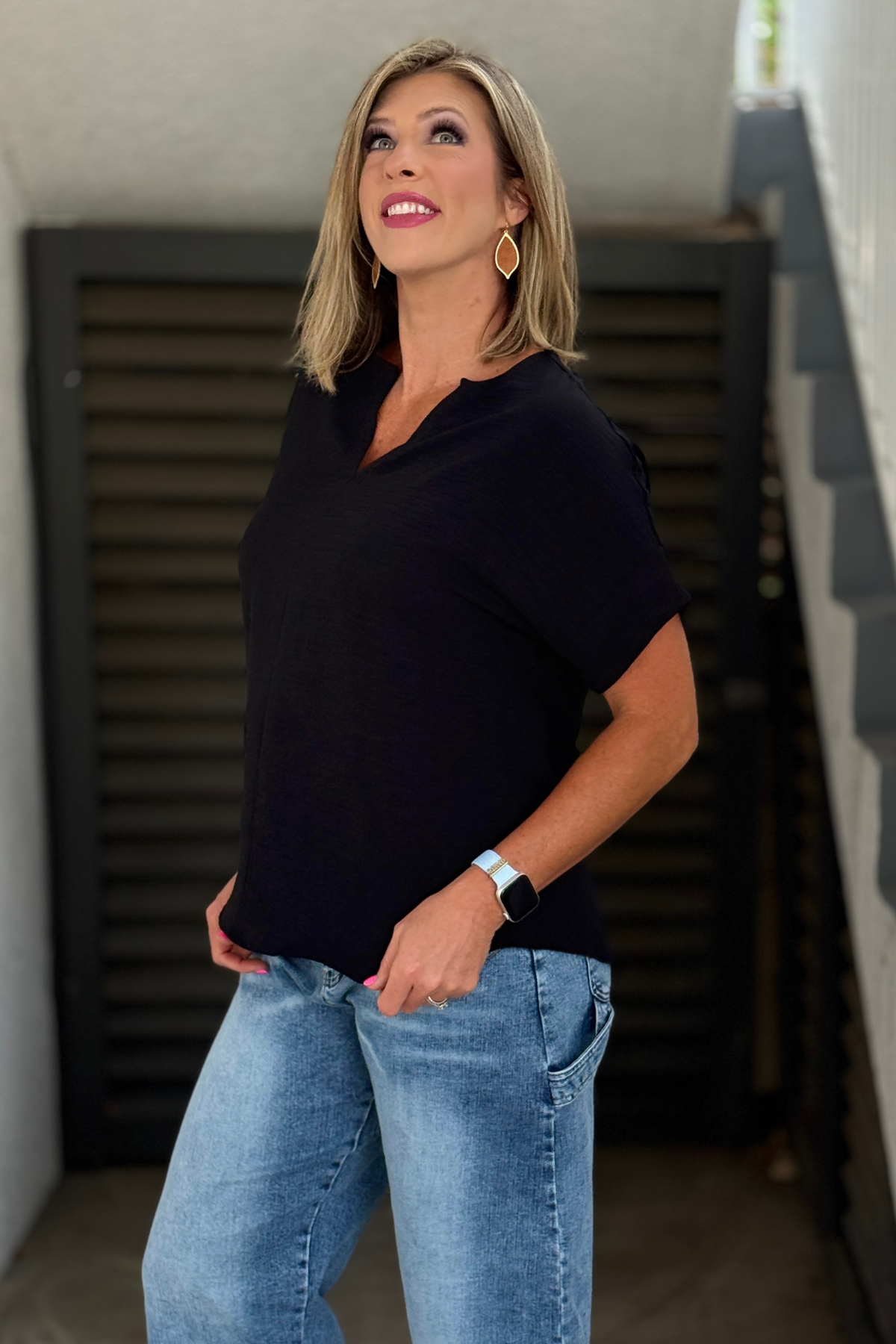 Lightweight black woven top with short sleeves