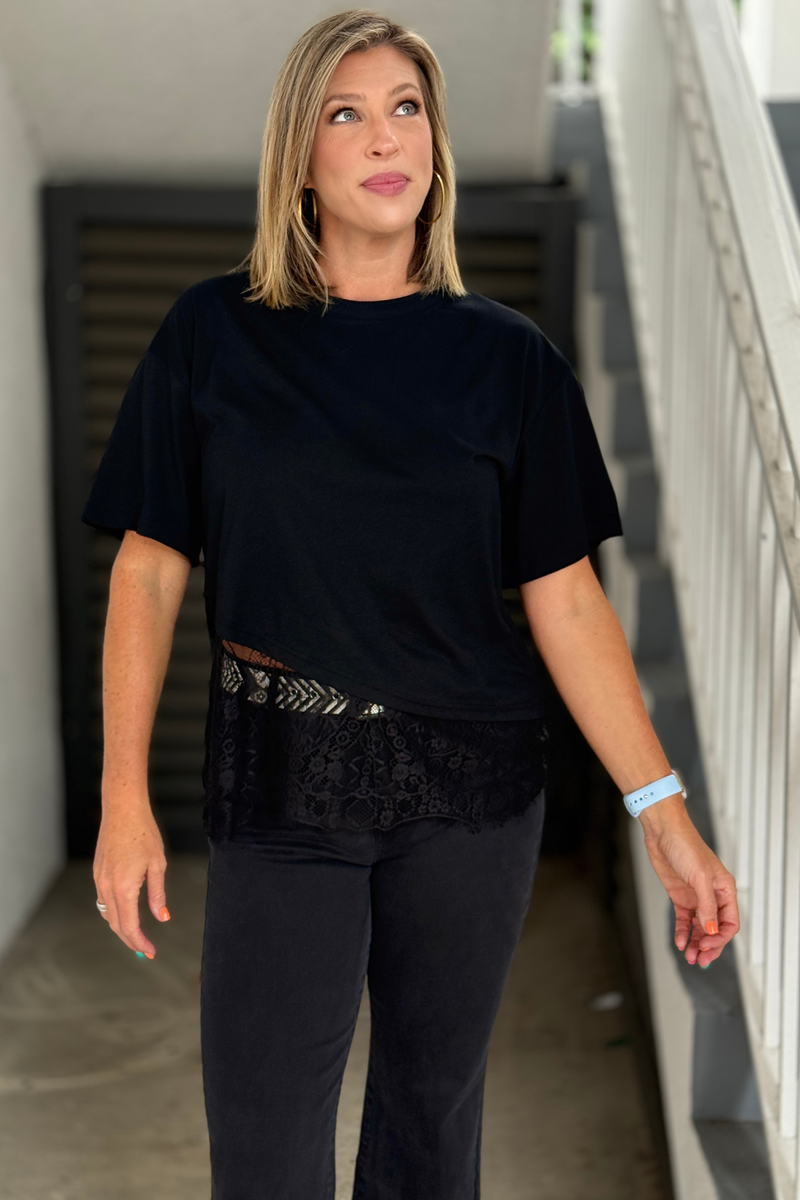 Women's relaxed fit black tee with floral lace hem