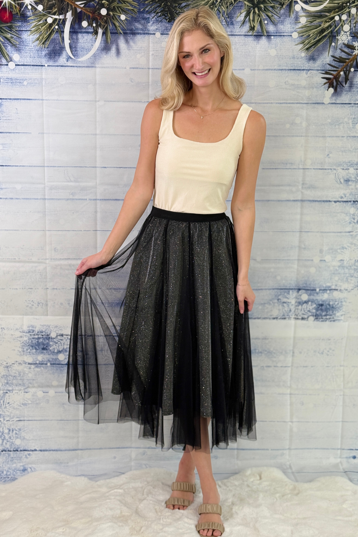 Black mesh skirt with shimmer underlayer
Dressy black midi skirt for holiday parties