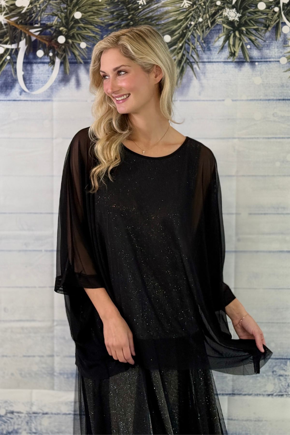 Black holiday party top for Christmas 2026