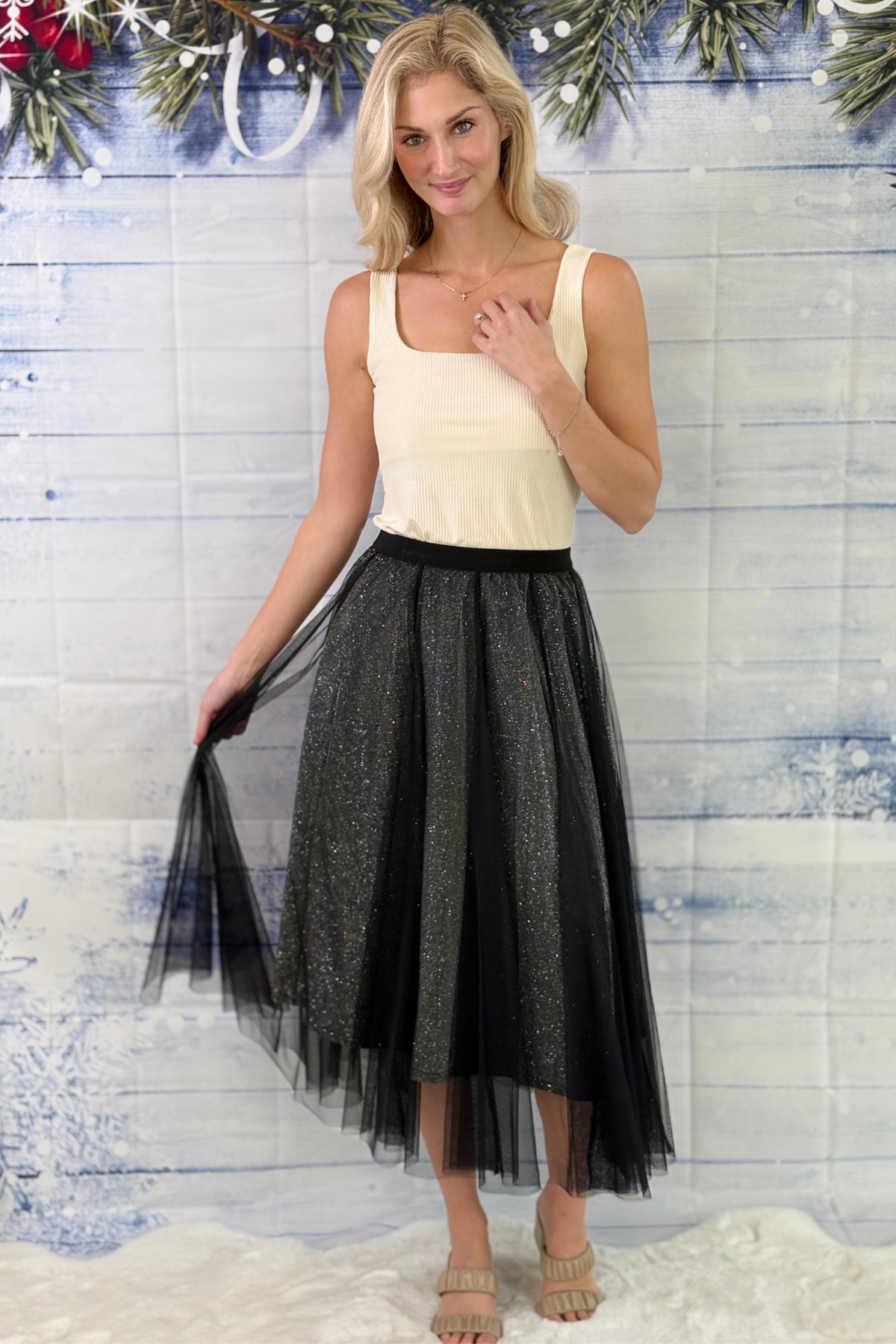 Sparkly black midi skirt styled for Christmas