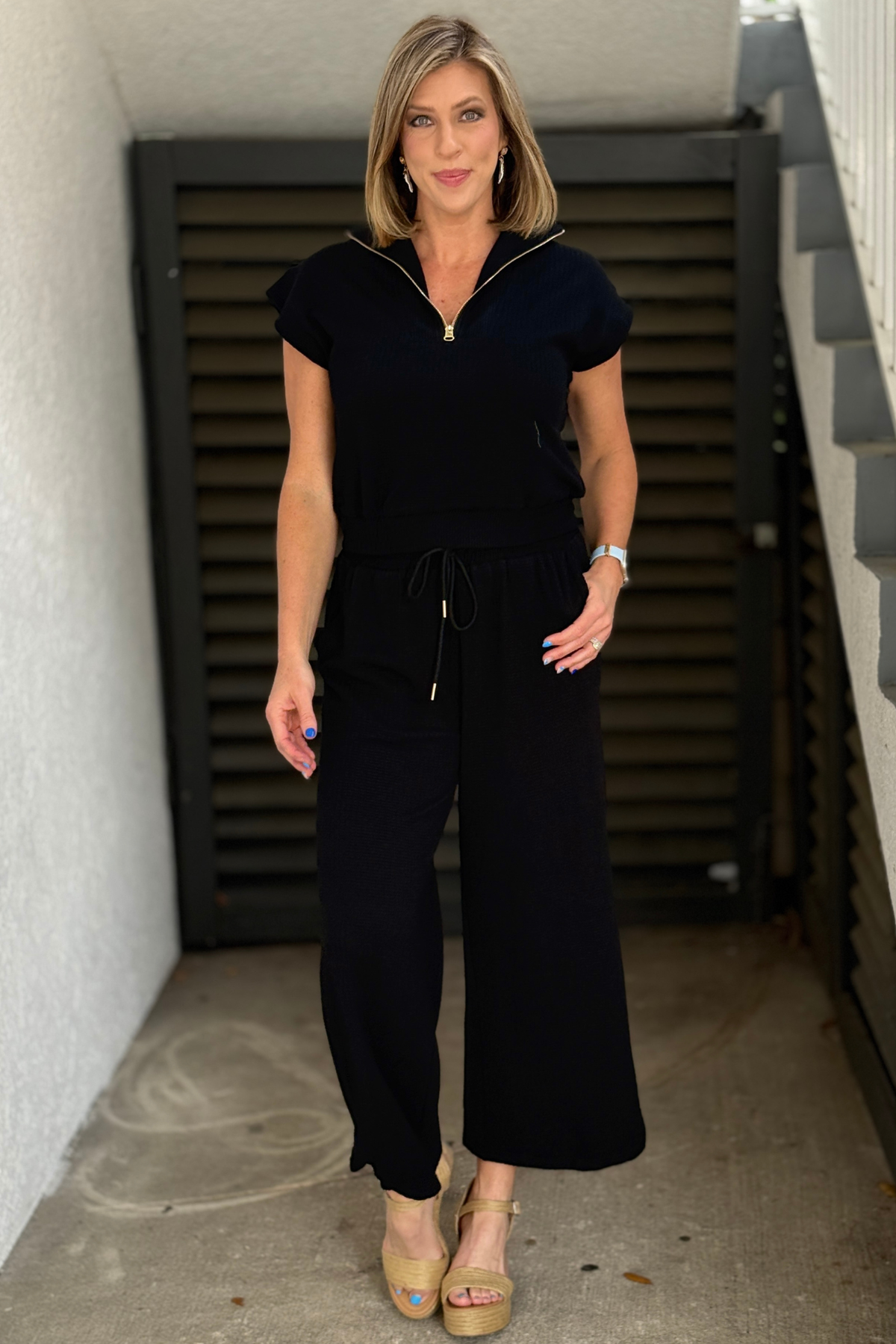 women’s black matching set with elastic hem pants and relaxed fit top