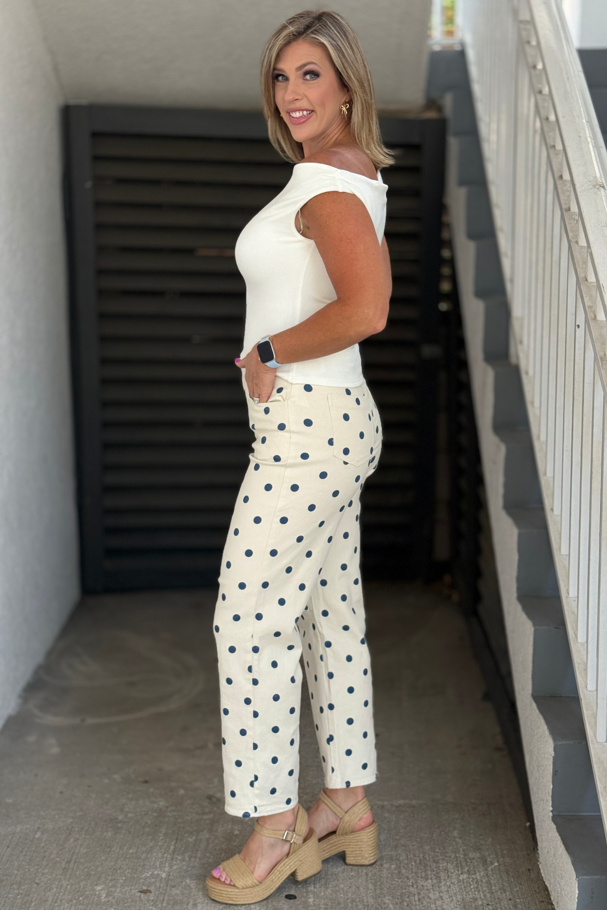 Trendy high-waisted polka dot pants with relaxed barrel silhouette