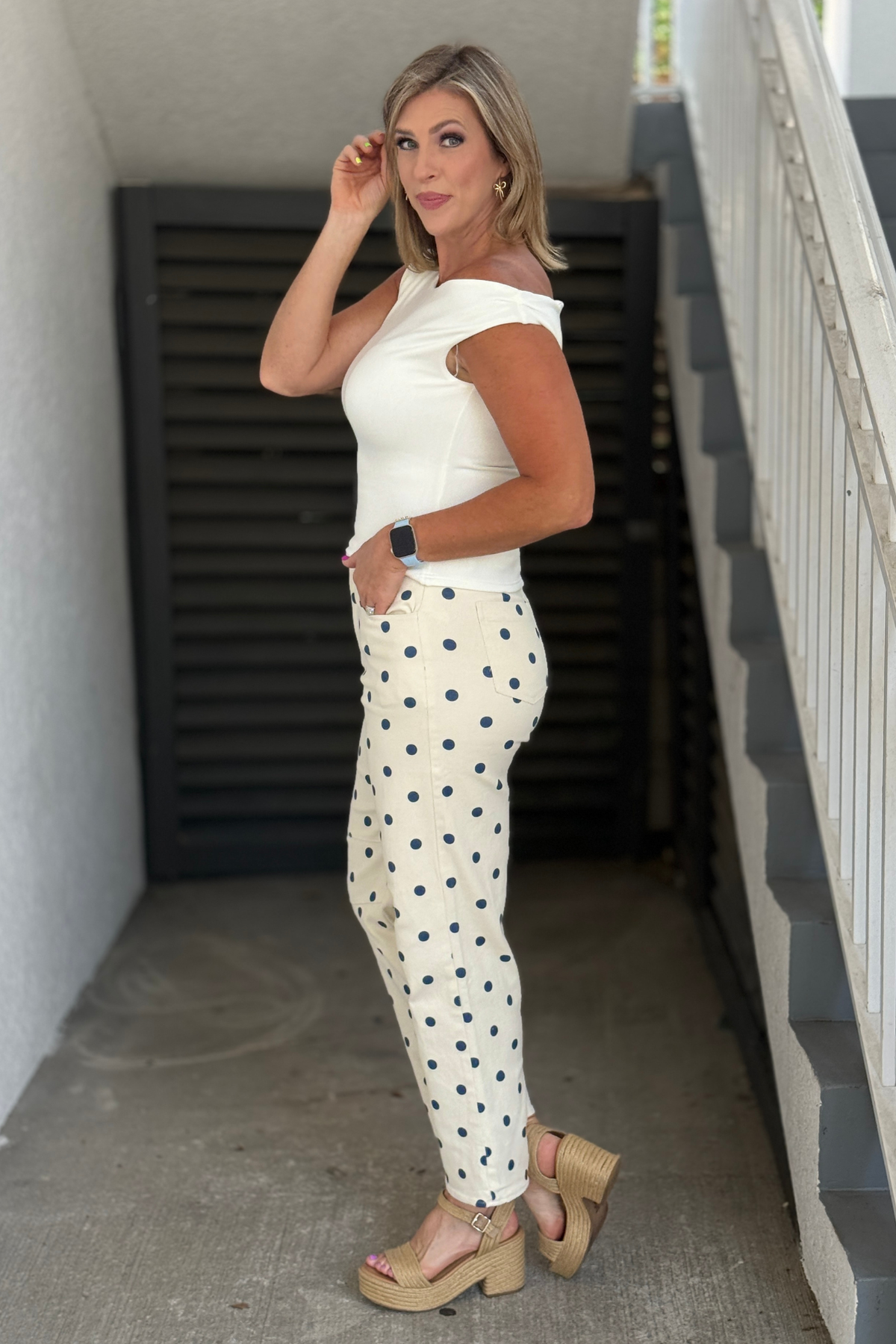 Fashion-forward barrel pants styled with a white off-shoulder top
