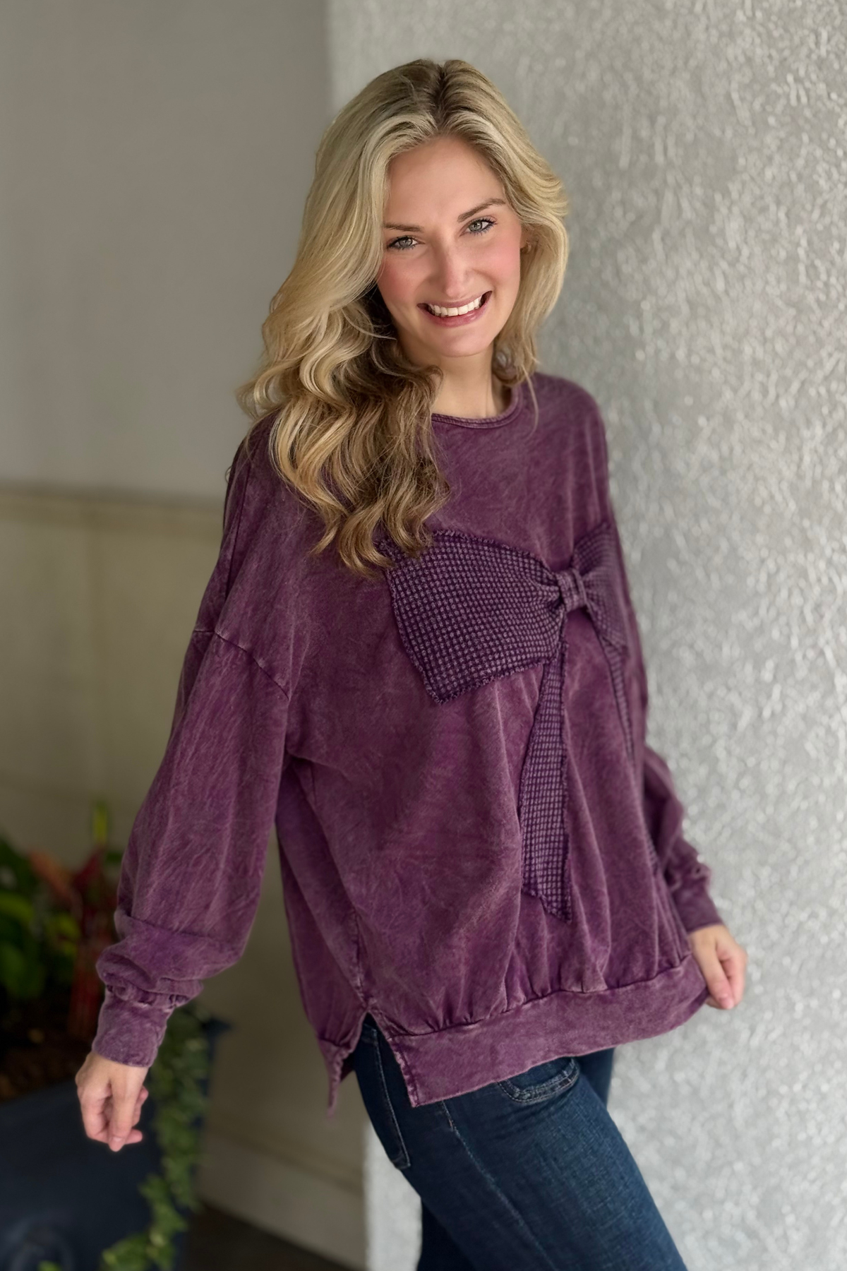 Close-up of waffle knit bow detail in Eggplant