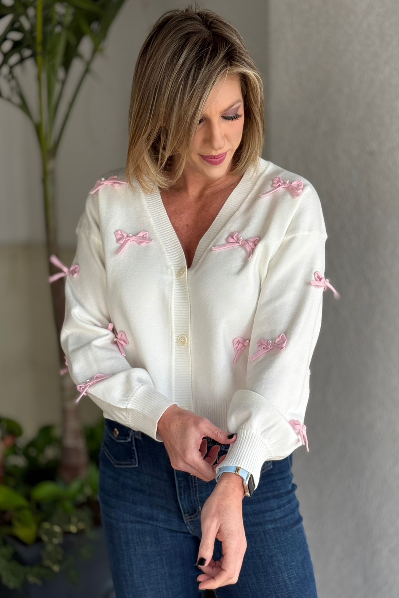 Cardigan with pink bows