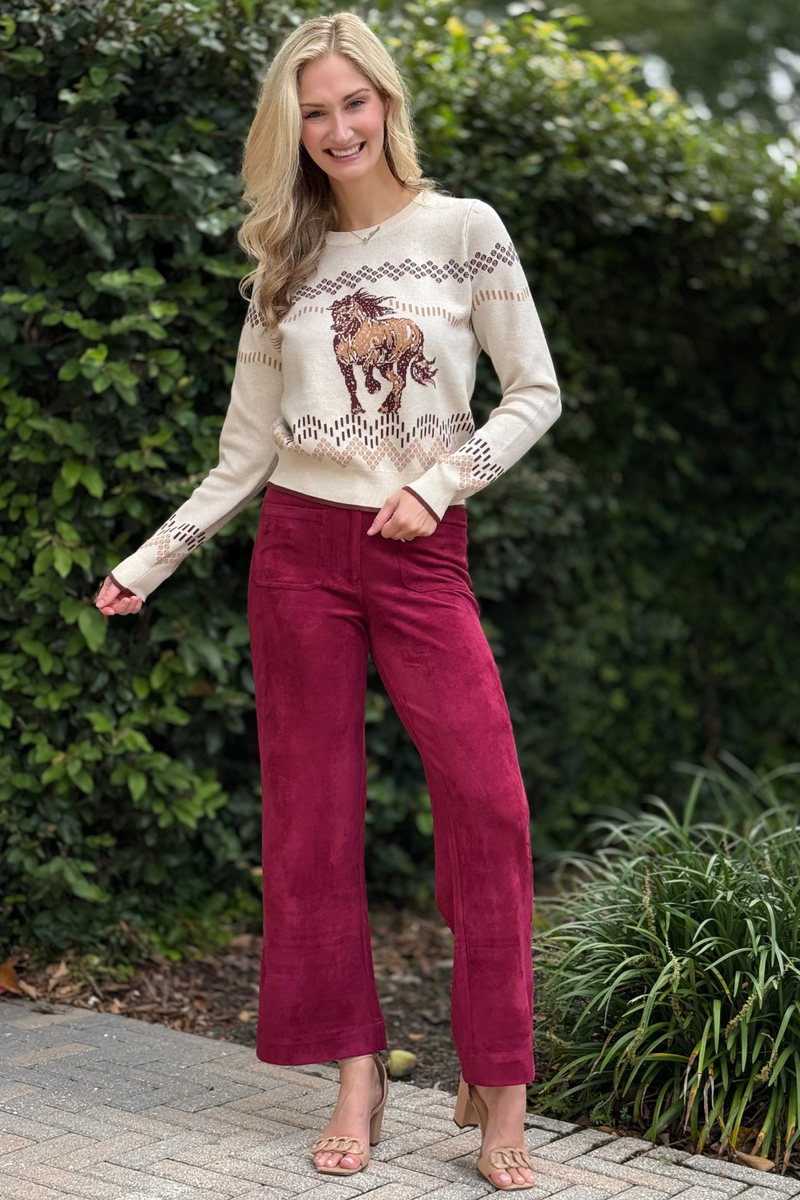 Faux Suede Wide Leg Pants in Burgundy paired with a printed sweater