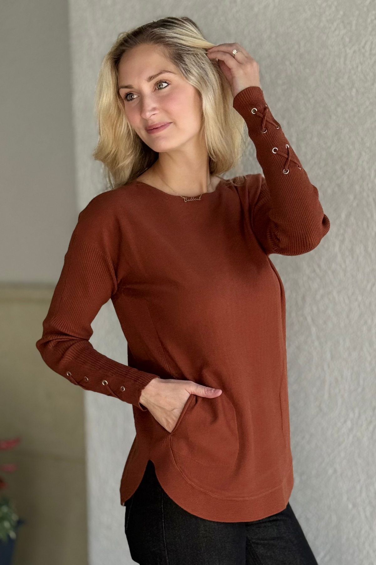 Warm, stylish, and effortlessly chic—Charlie B’s Lace-Up Elegance Knit Sweater in Sepia is your fall essential.