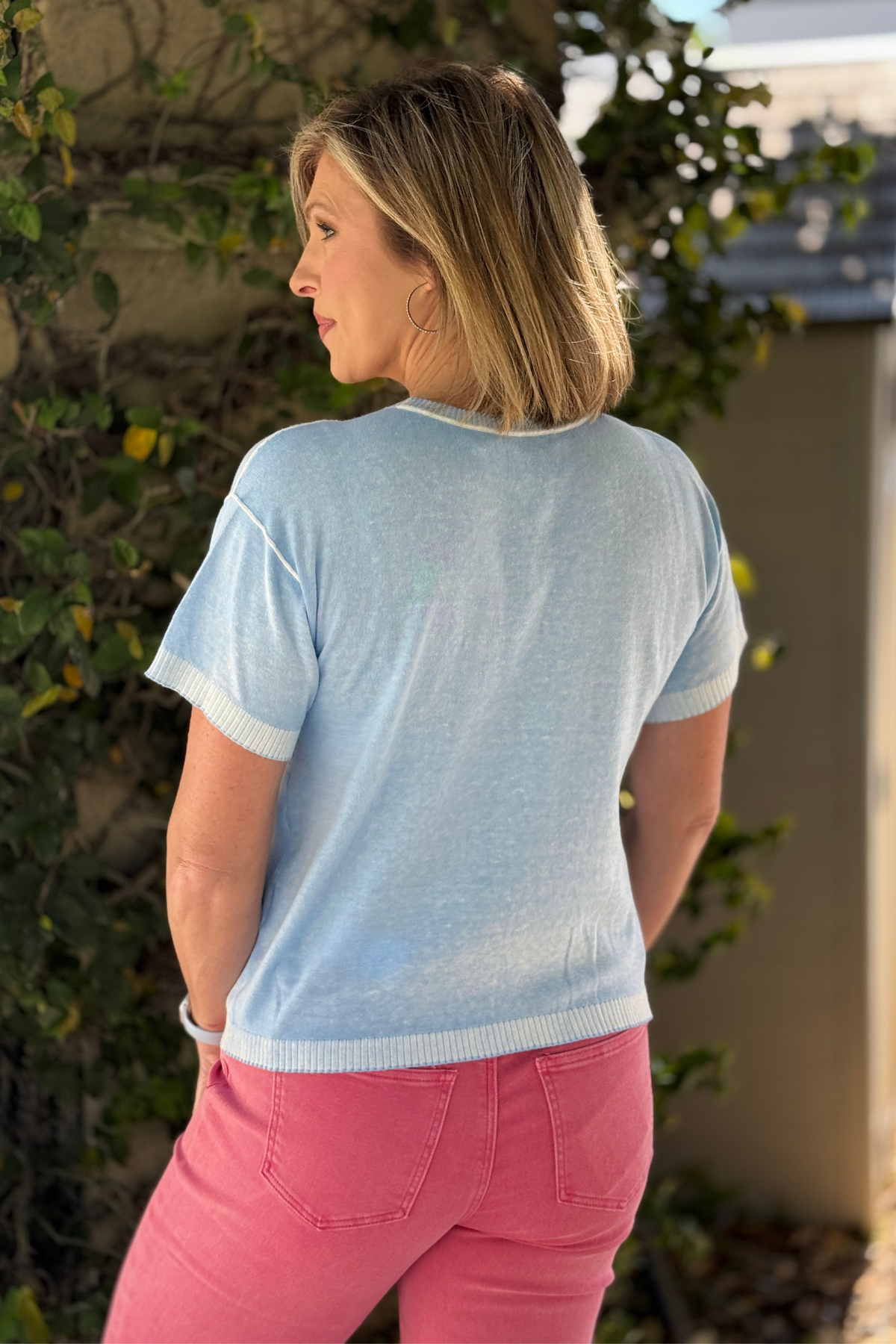 spring blue sweater with ribbed trim detail