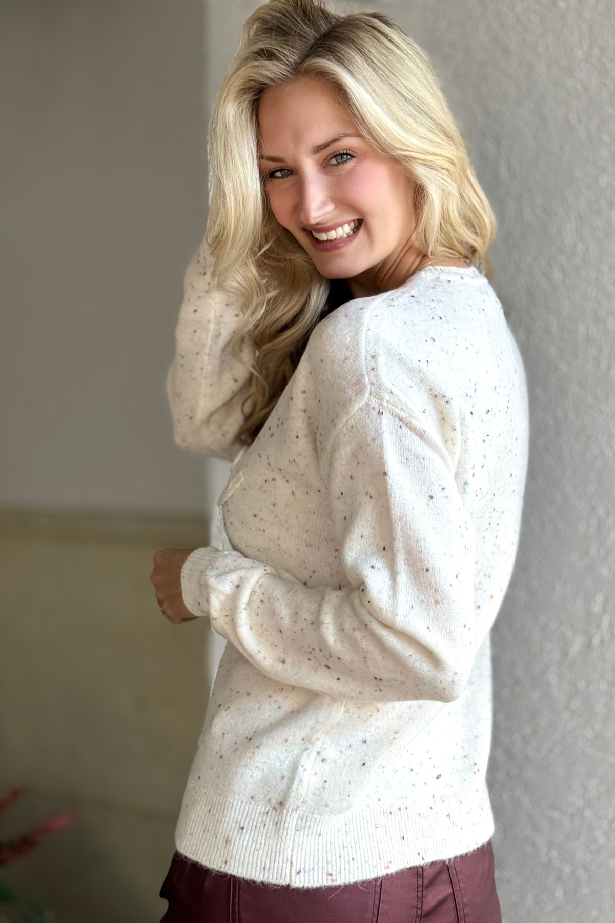 Back view of Charlie B Braided Love Crew Neck Sweater showing drop shoulder and relaxed fit.