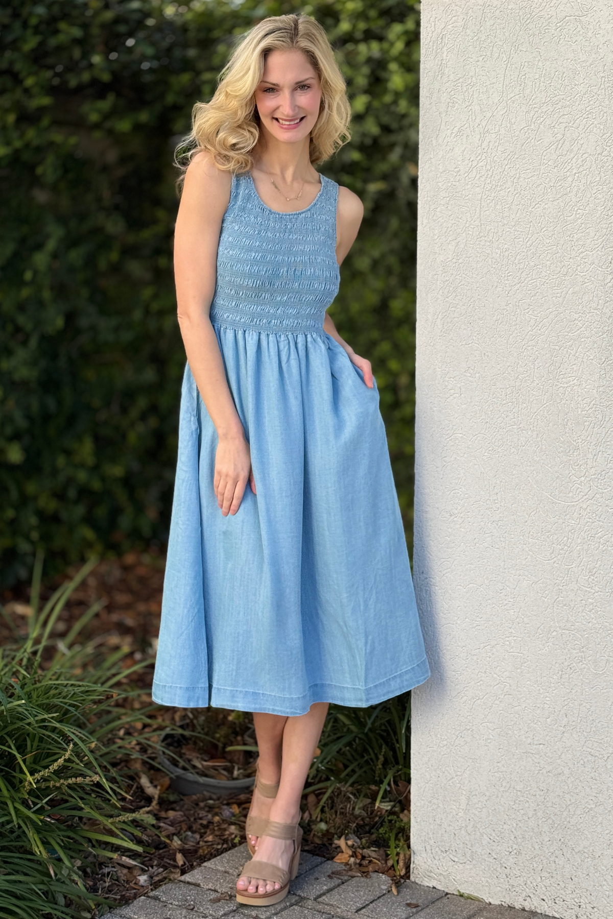 Soft blue sleeveless Tencel maxi dress with smocked bodice and scoop neckline