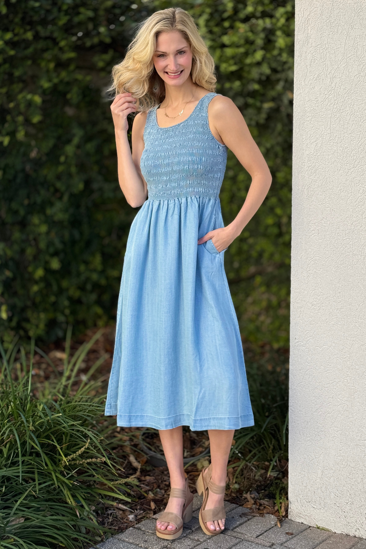 Flowy soft blue maxi dress with side pockets and smocked top