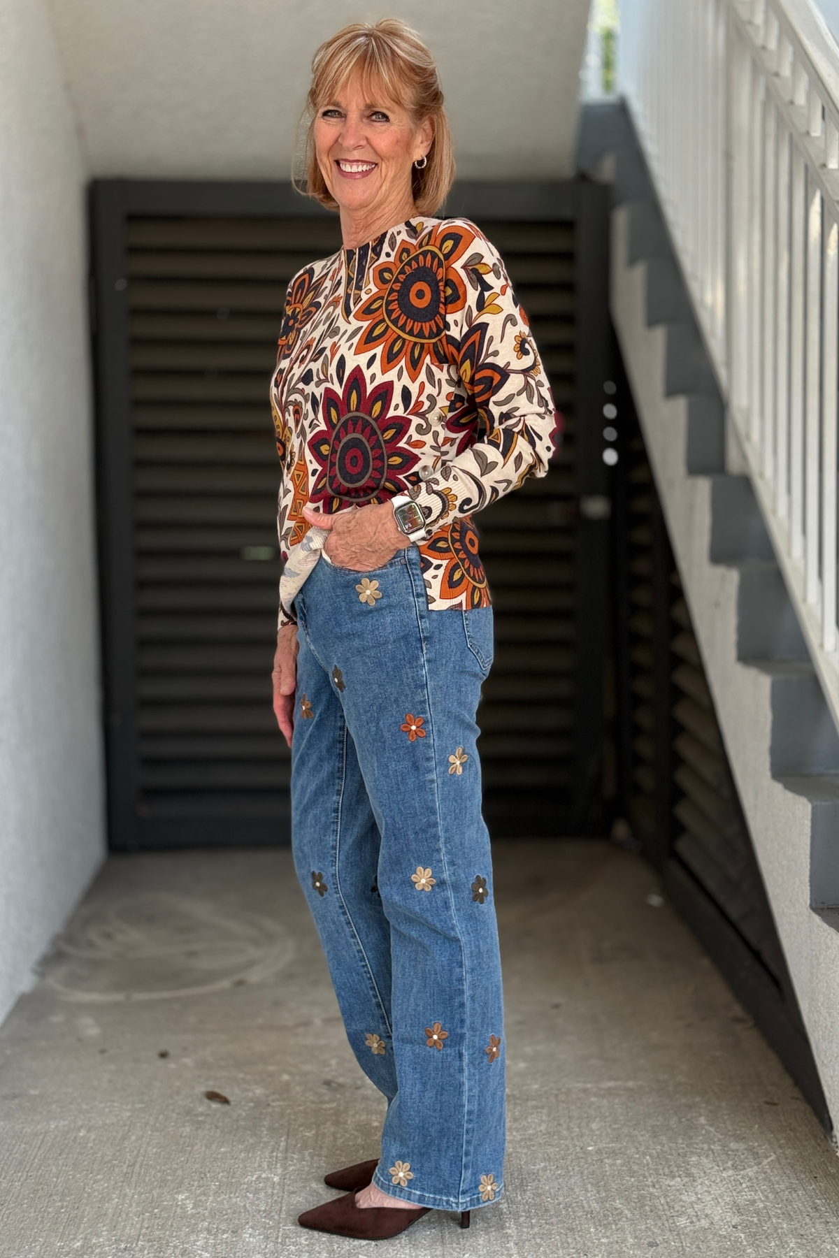 Women's floral embroidered indigo jeans by Charlie B