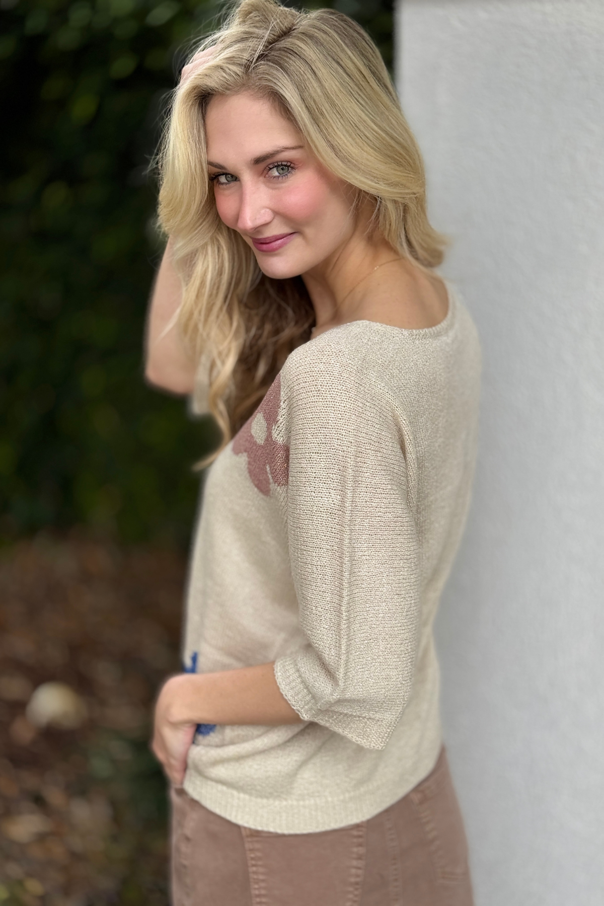 Charlie B V-neck floral knit sweater styled with skirt