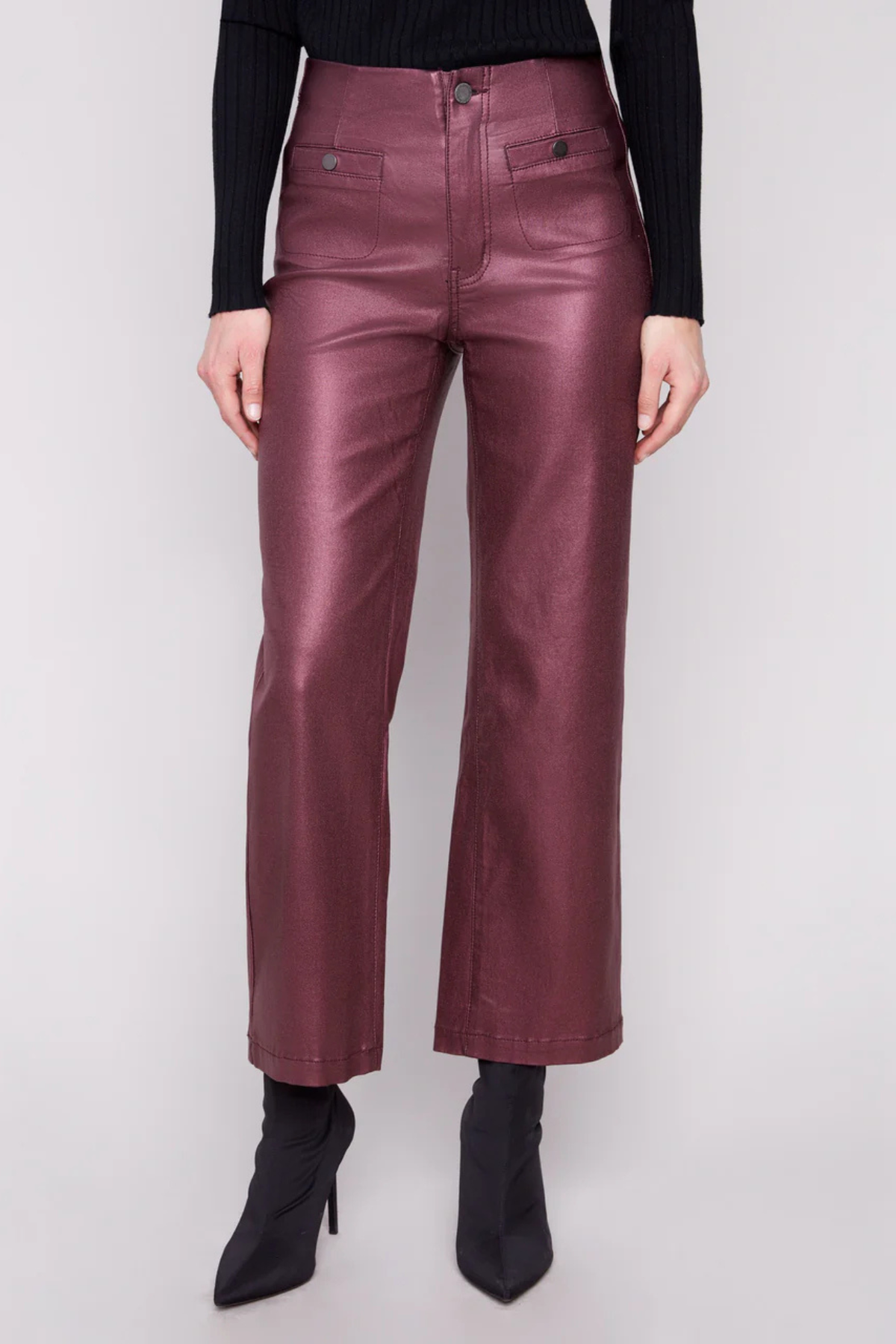 Model wearing Charlie B Metallic Wax Flared Pants in Cabernet — cropped flare fit with metallic finish.