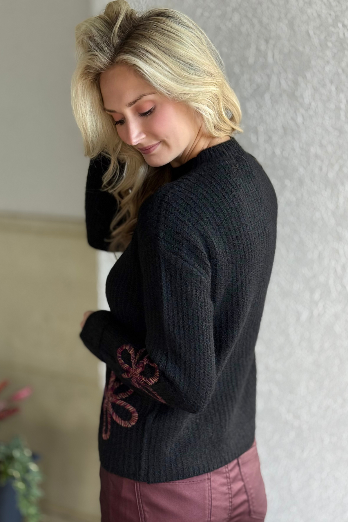 Back view of Charlie B Mock Neck Floral Soutache Sweater showing ribbed texture and cozy silhouette.