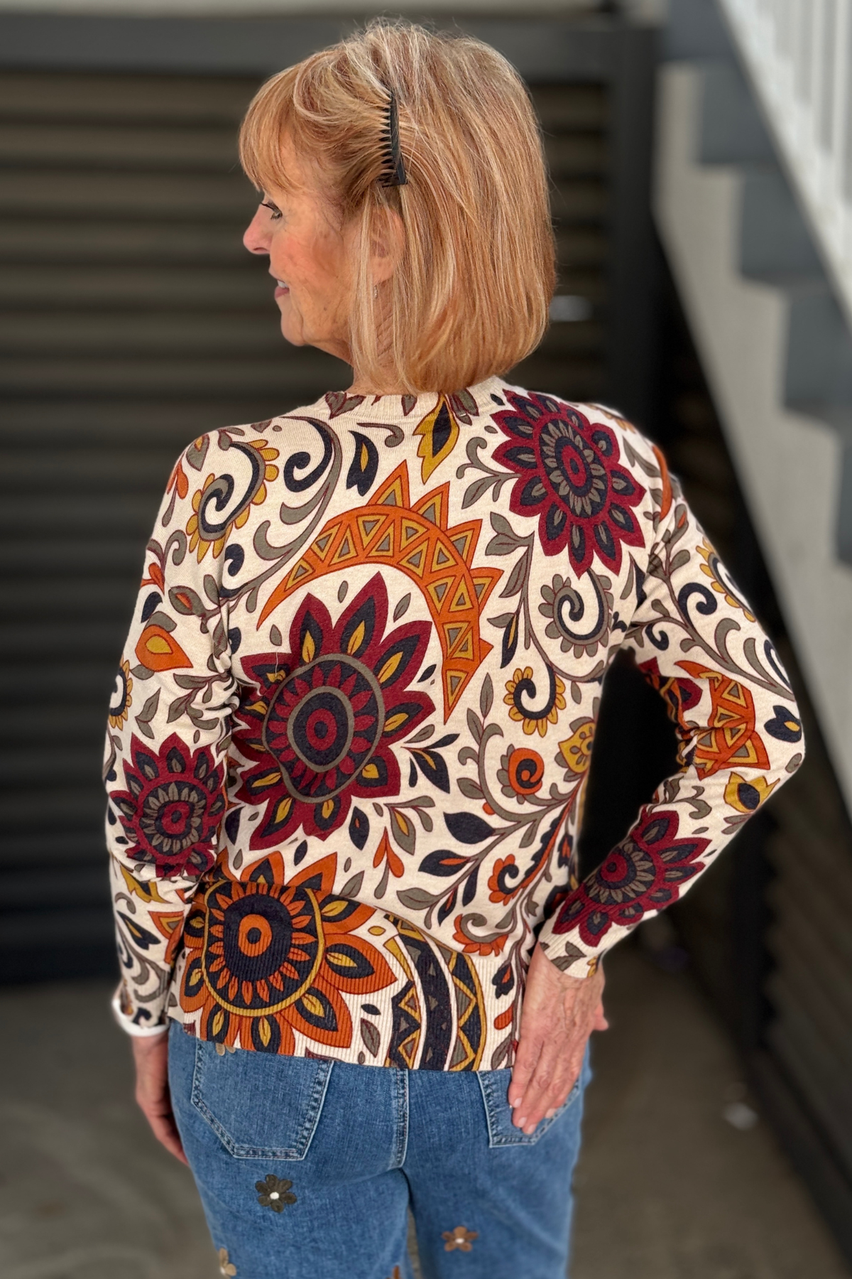 Back view of Charlie B Rio Print long sleeve sweater