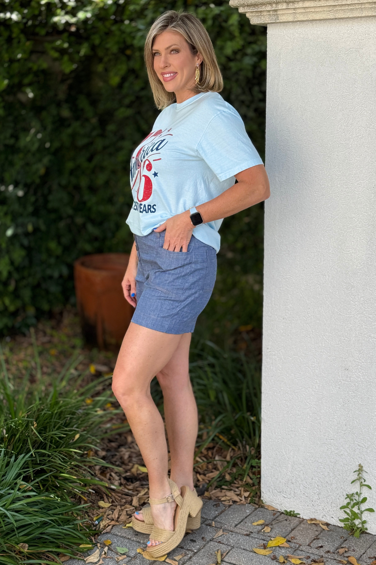 lightweight summer shorts styled with white top and sandals