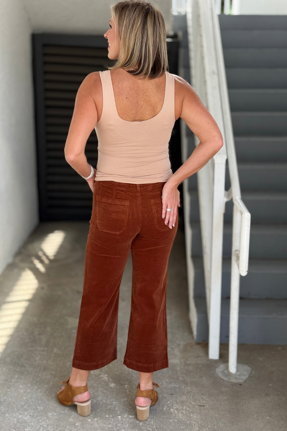 Cropped wide leg corduroy pants styled for fall