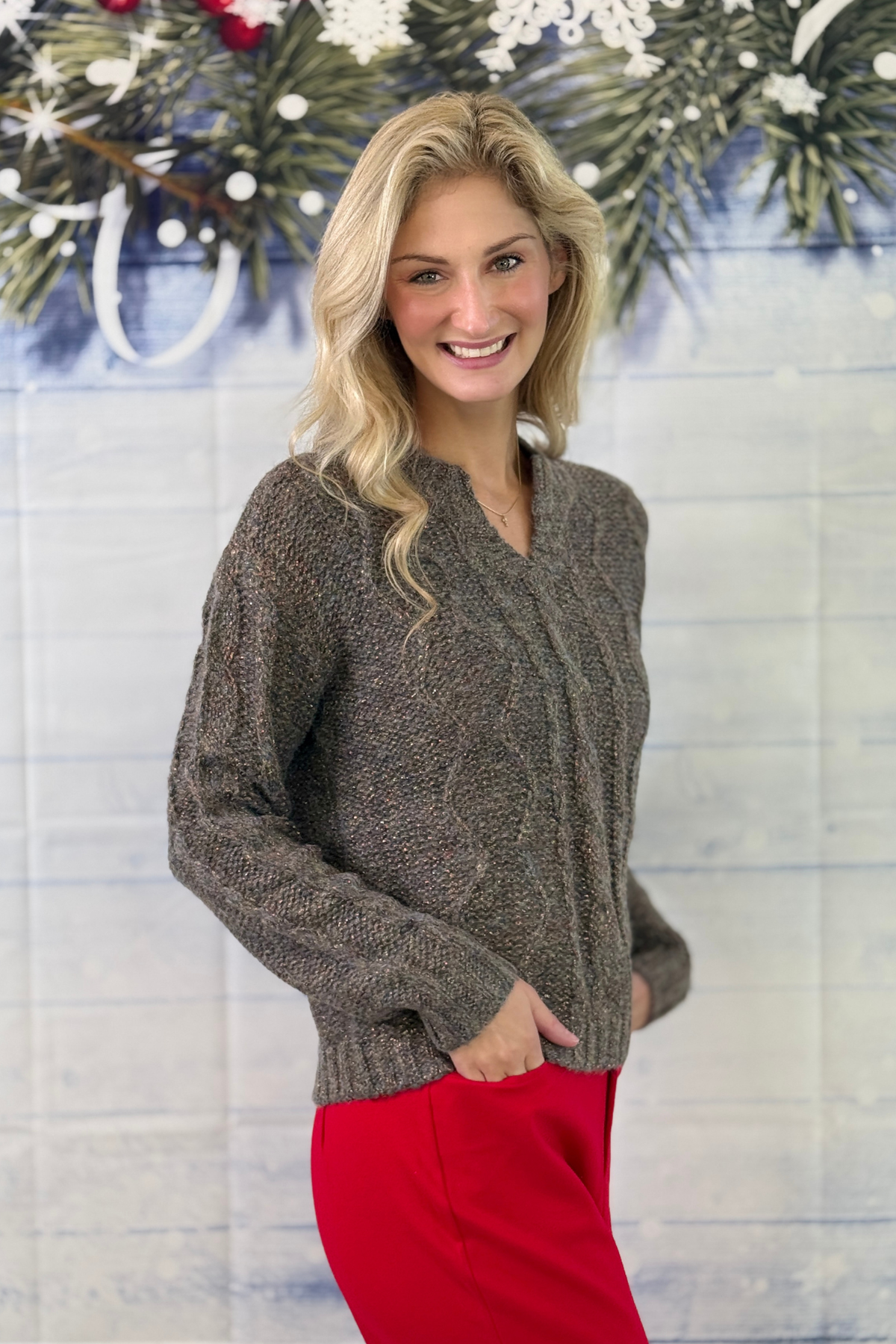Dark grey holiday shimmer cable knit sweater with notch neckline