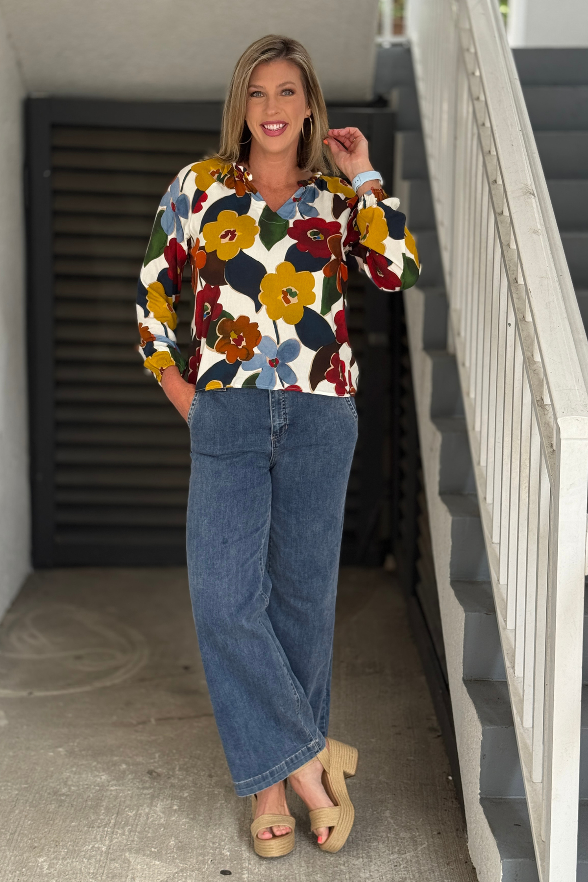 Women's belted wide leg denim styled with a brown top
