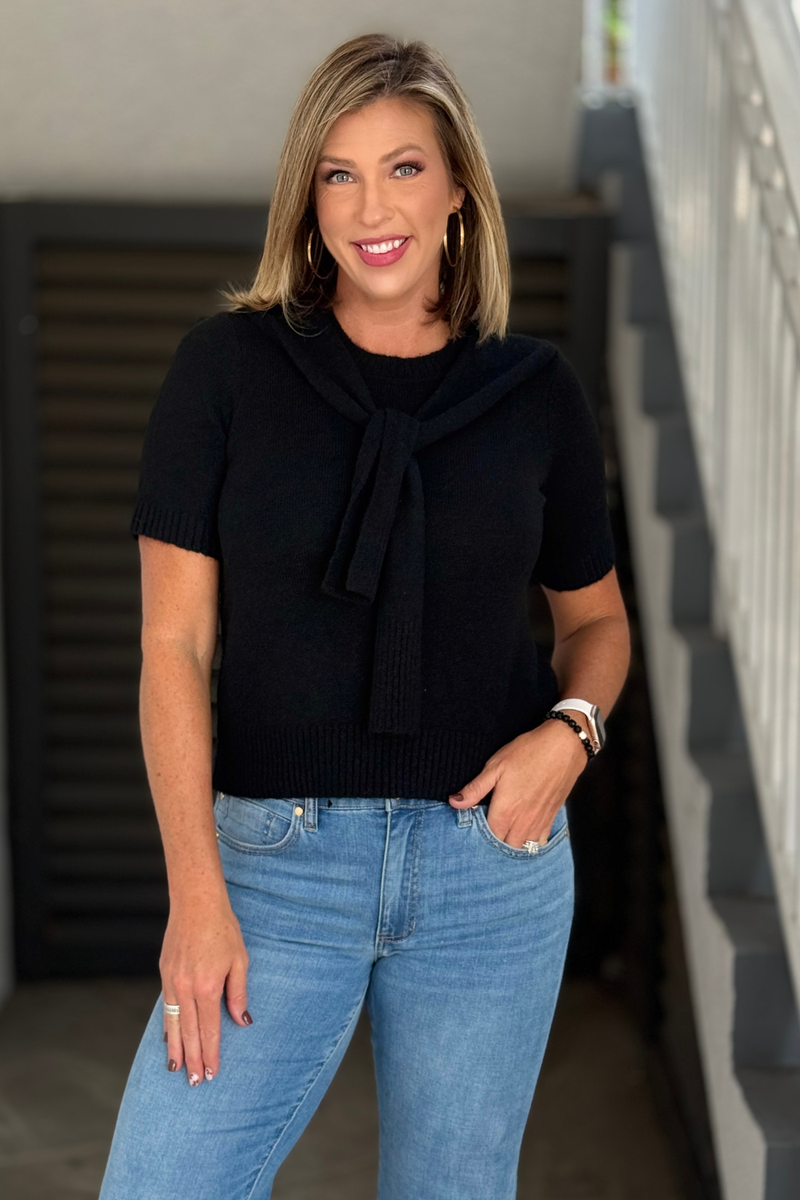Women’s Charlie B black short sleeve knit sweater with draped shoulder detail