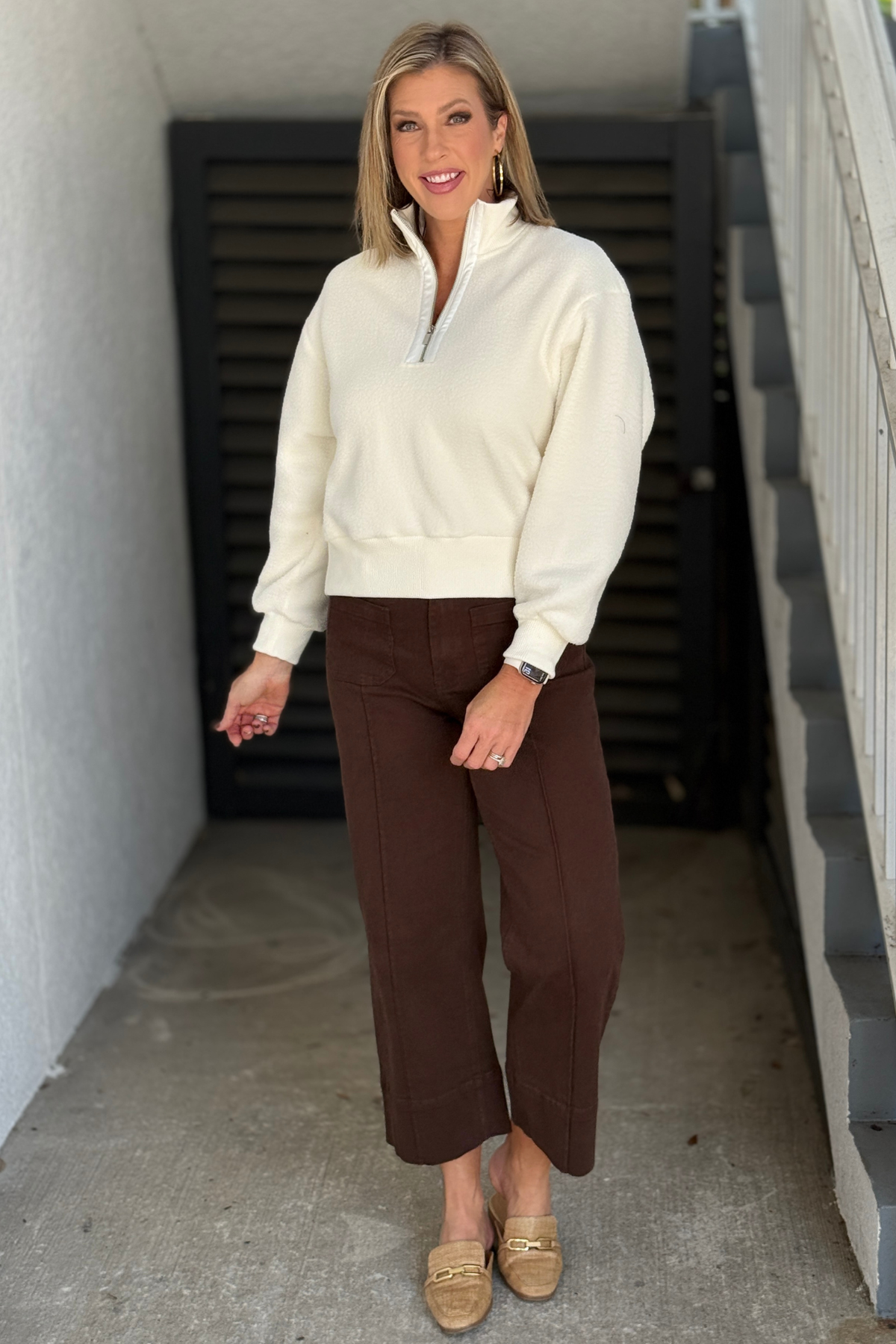 Ecru women’s half-zip fleece sweater with ribbed cuffs and hem