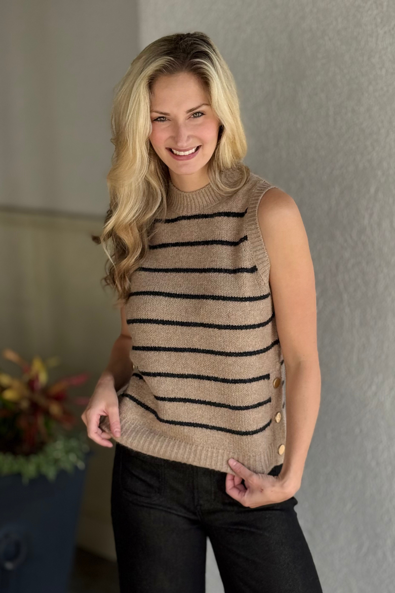 Close-up of faux button detail on camel knit vest by Charlie B