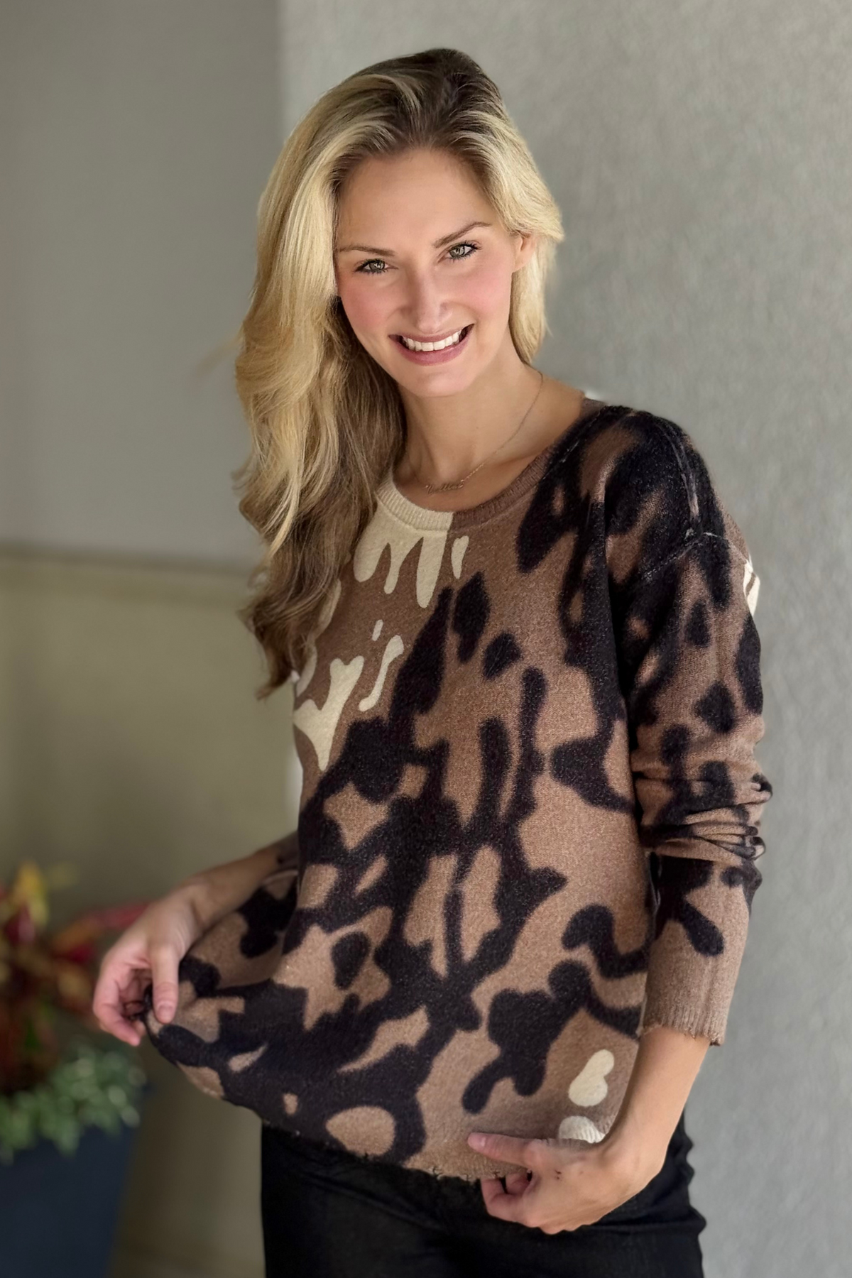 Charlie B reversible plush sweater in truffle and black spot print