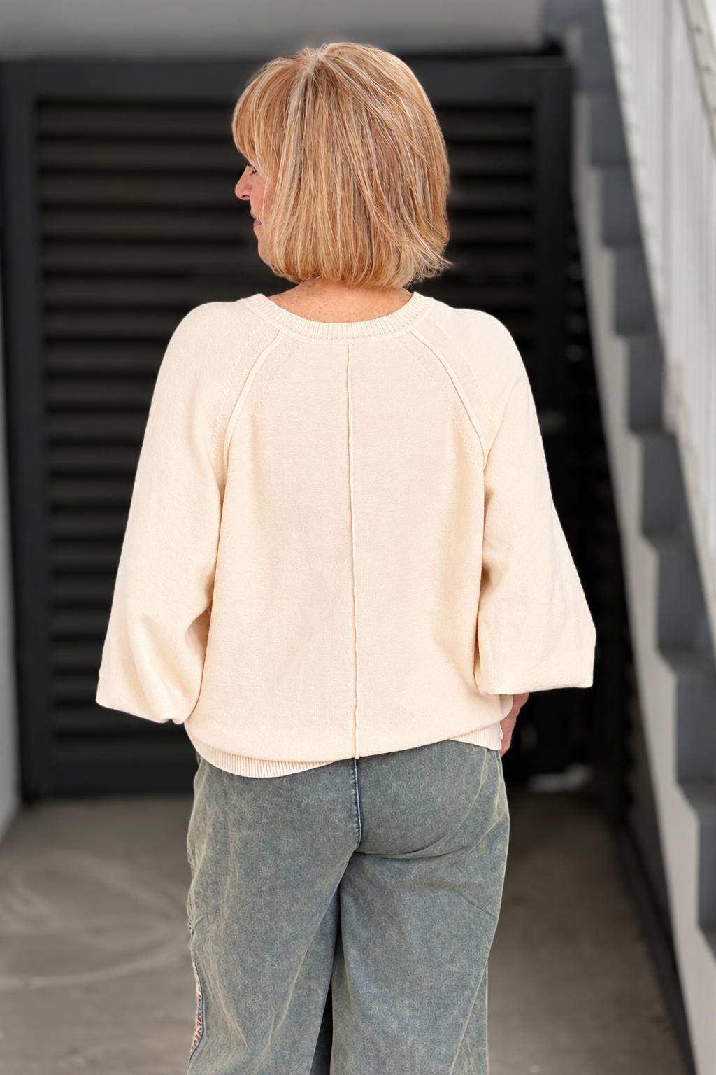 Women’s lightweight ivory knit henley sweater  
