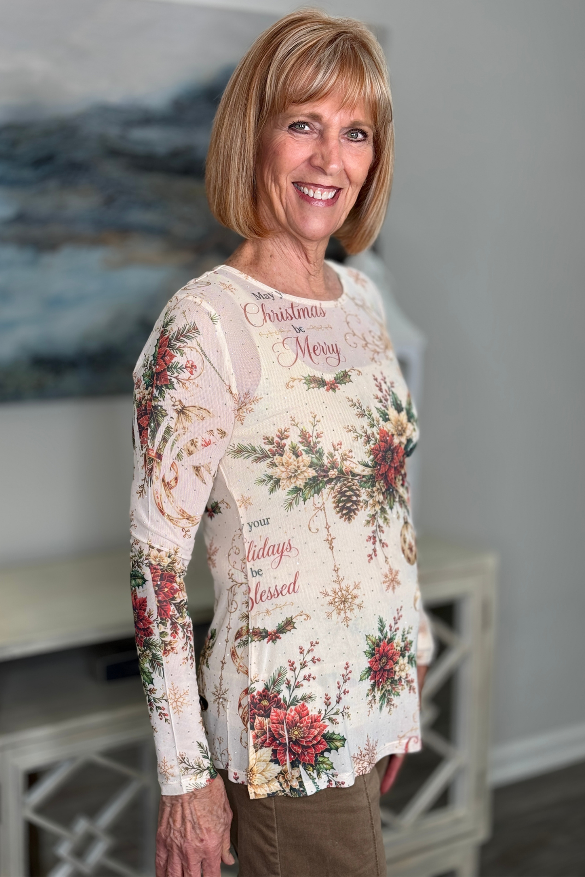 Christmas party top with poinsettias holly ornaments and sparkle