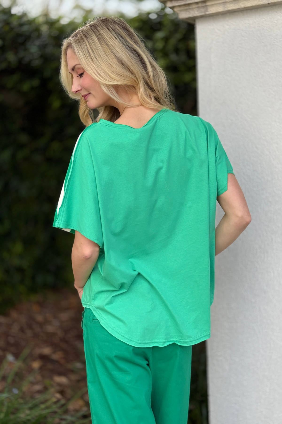 Relaxed fit green and ivory color block blouse