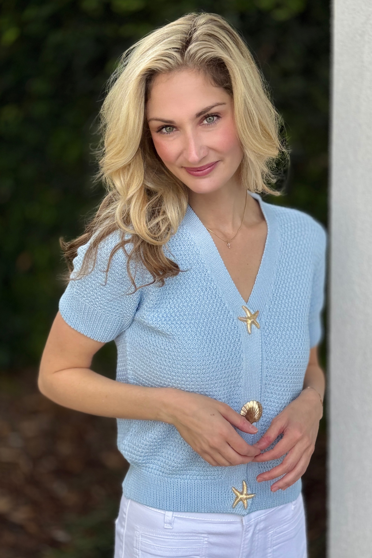 Blue textured knit cardigan with gold seashell buttons