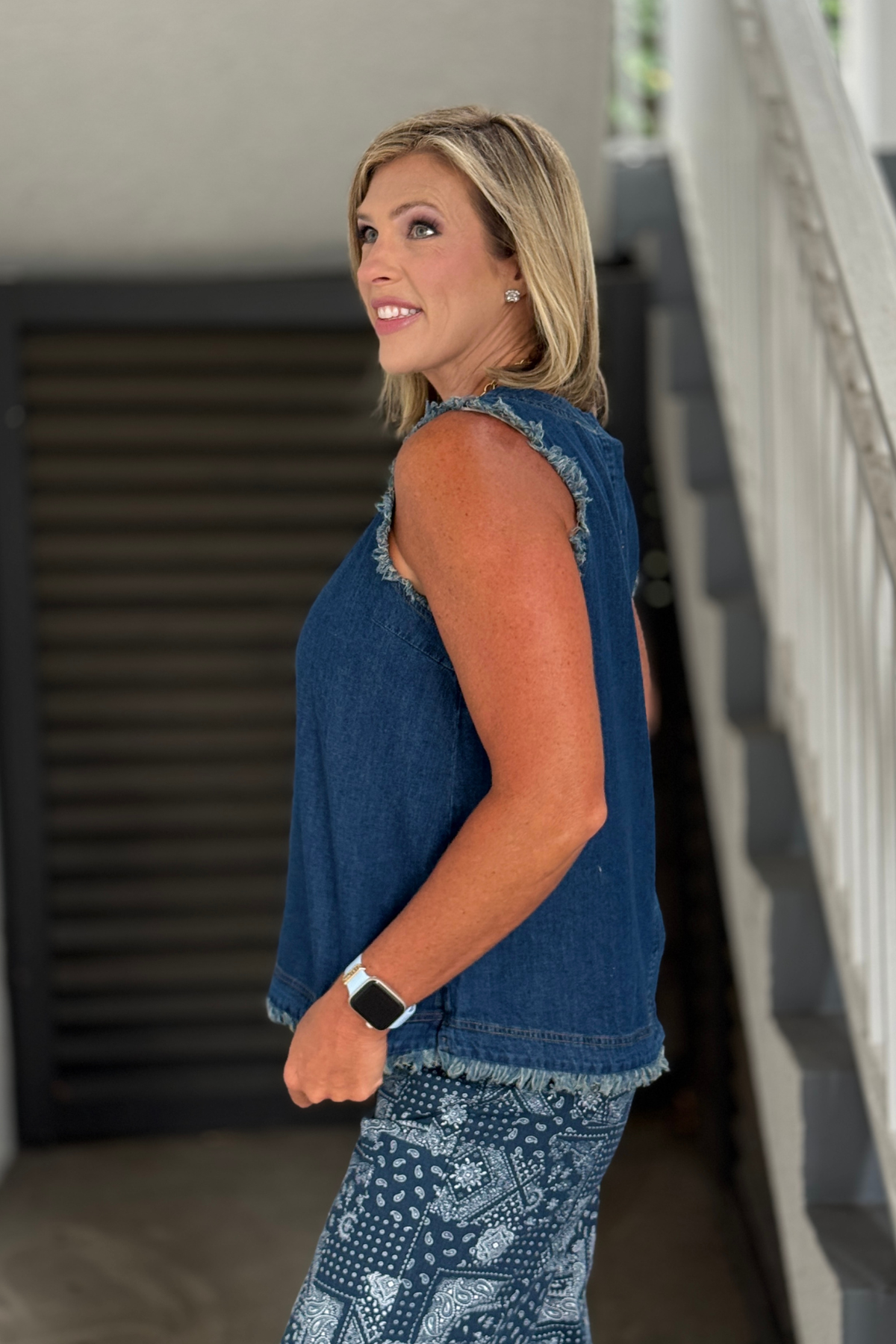 Sleeveless dark wash denim tank top